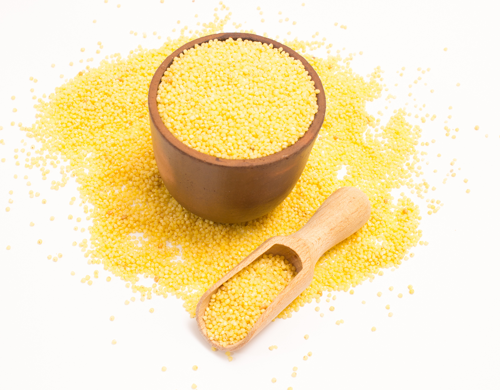 millet groats on the white background