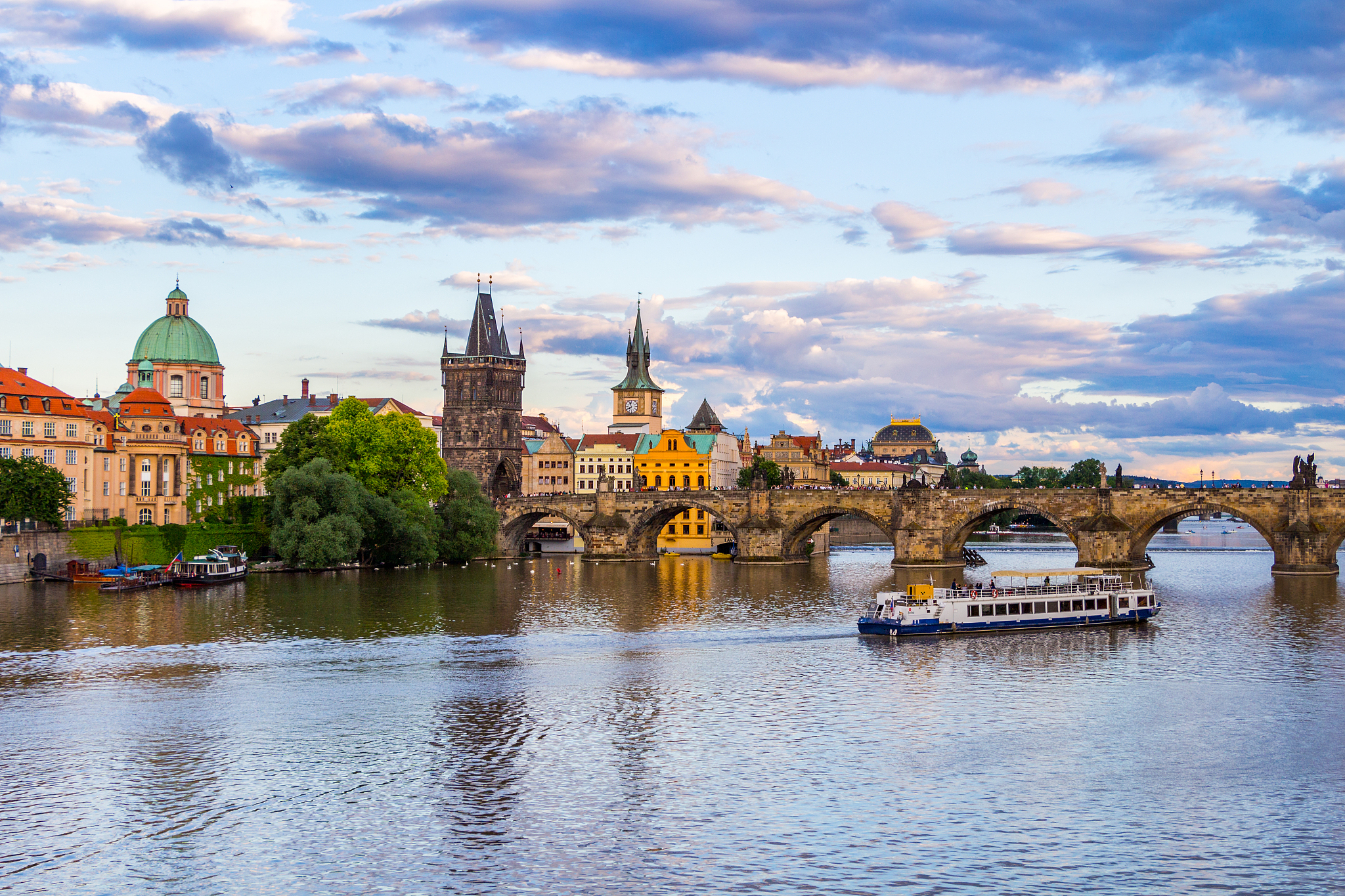 charles bridge in prague at sunset