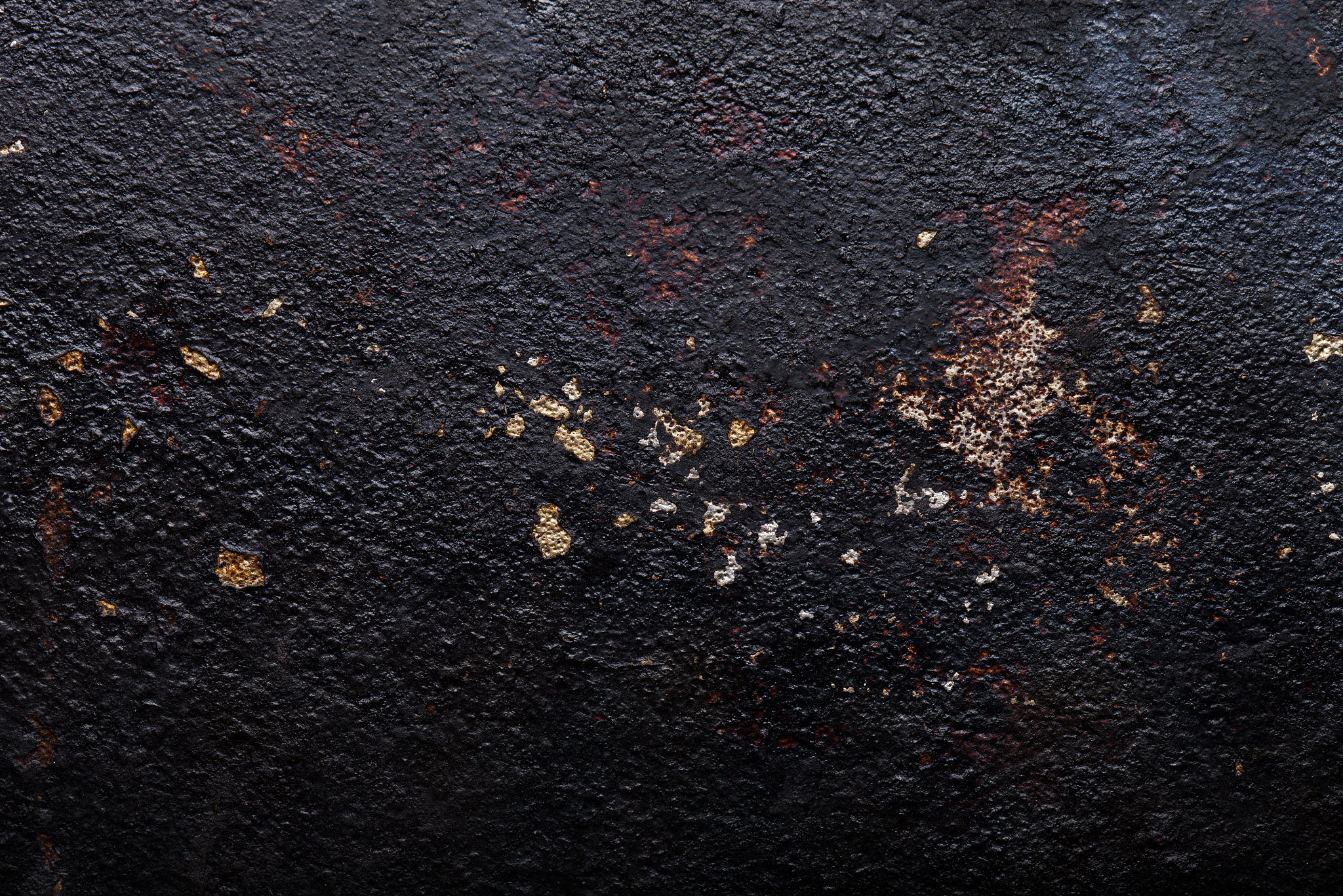 the bottom of the old metal frying pan