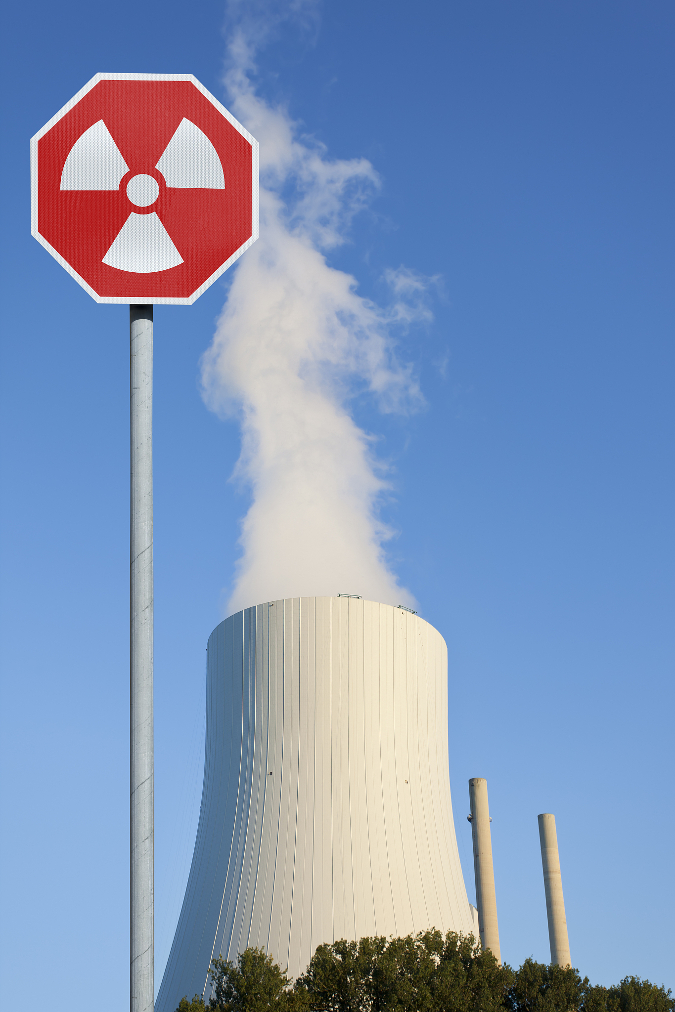 blue sky over cooling tower of power station