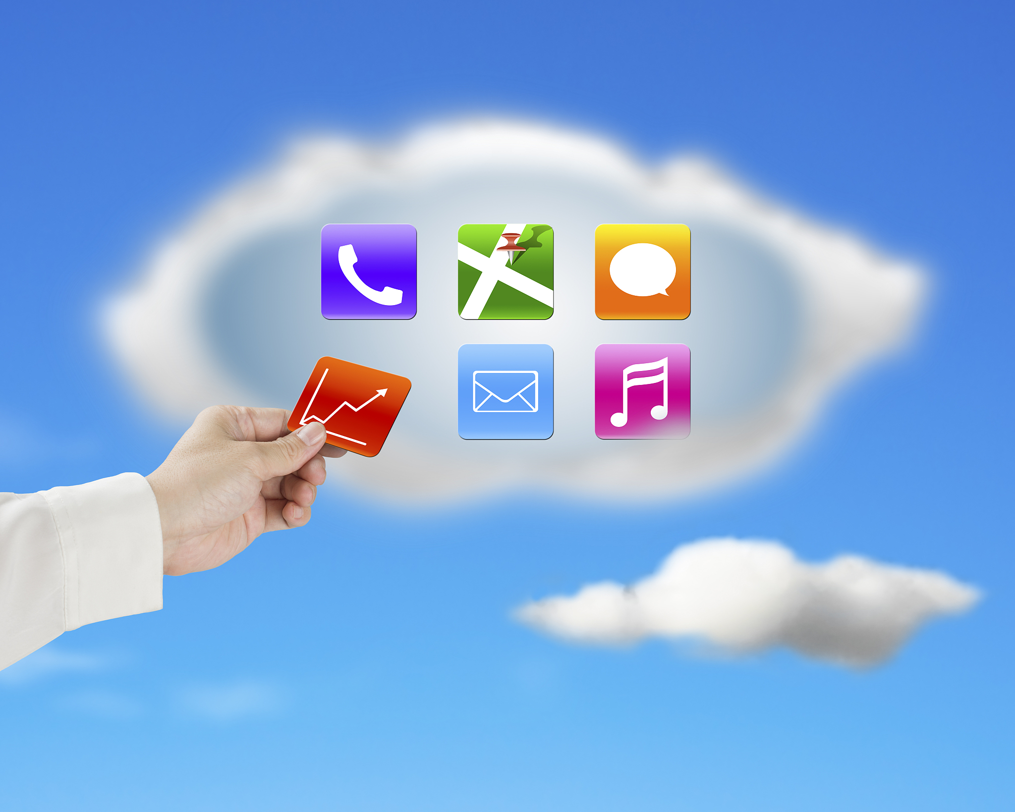 hand taking away app icon from cloud with nature sky