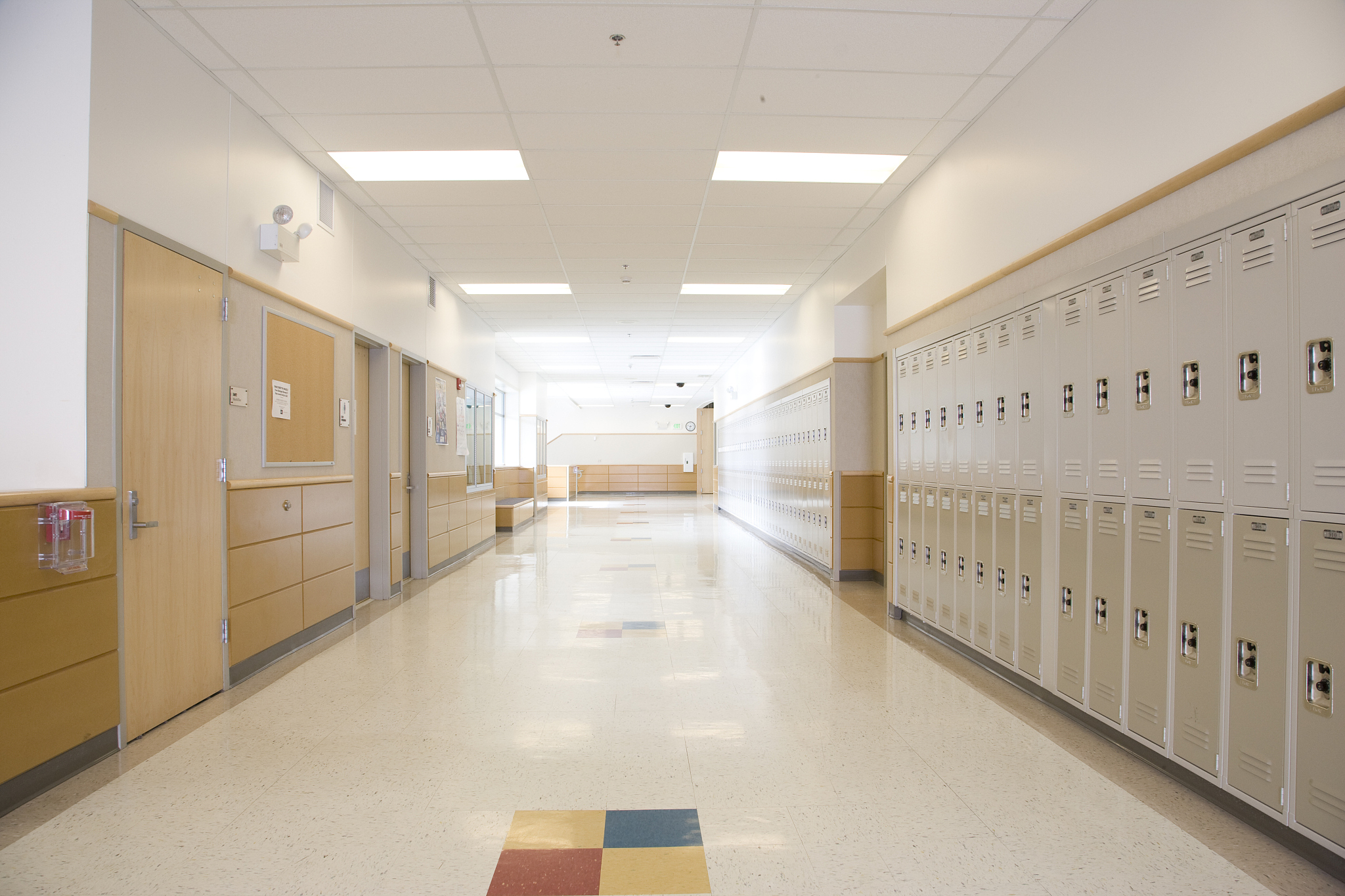 lockers in empty high school corridor