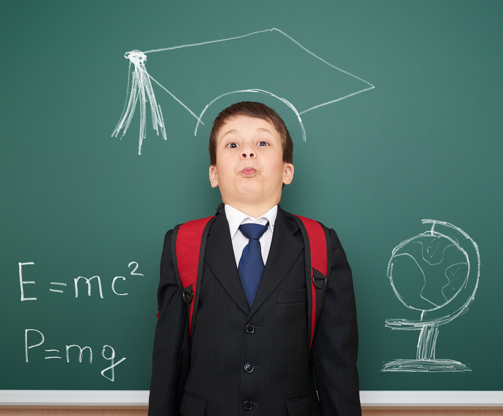 school boy with academic cap