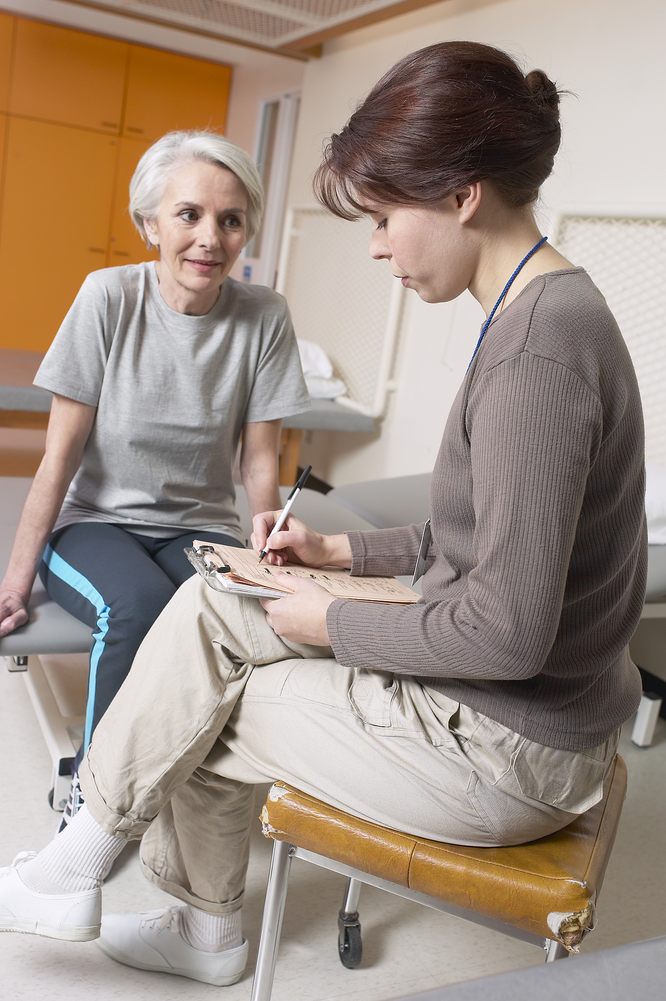 physical therapist with patient