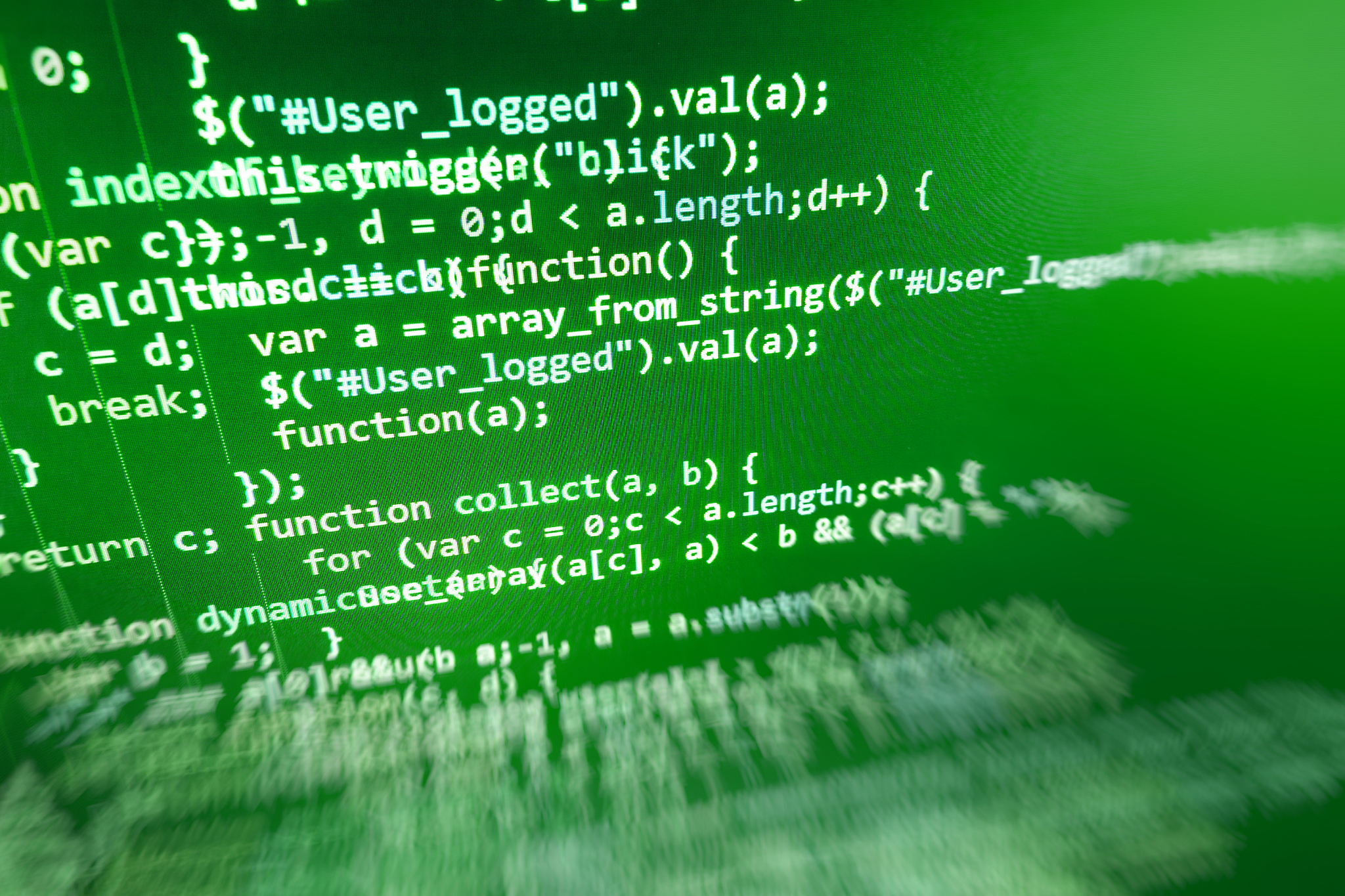 software developer programming code on computer