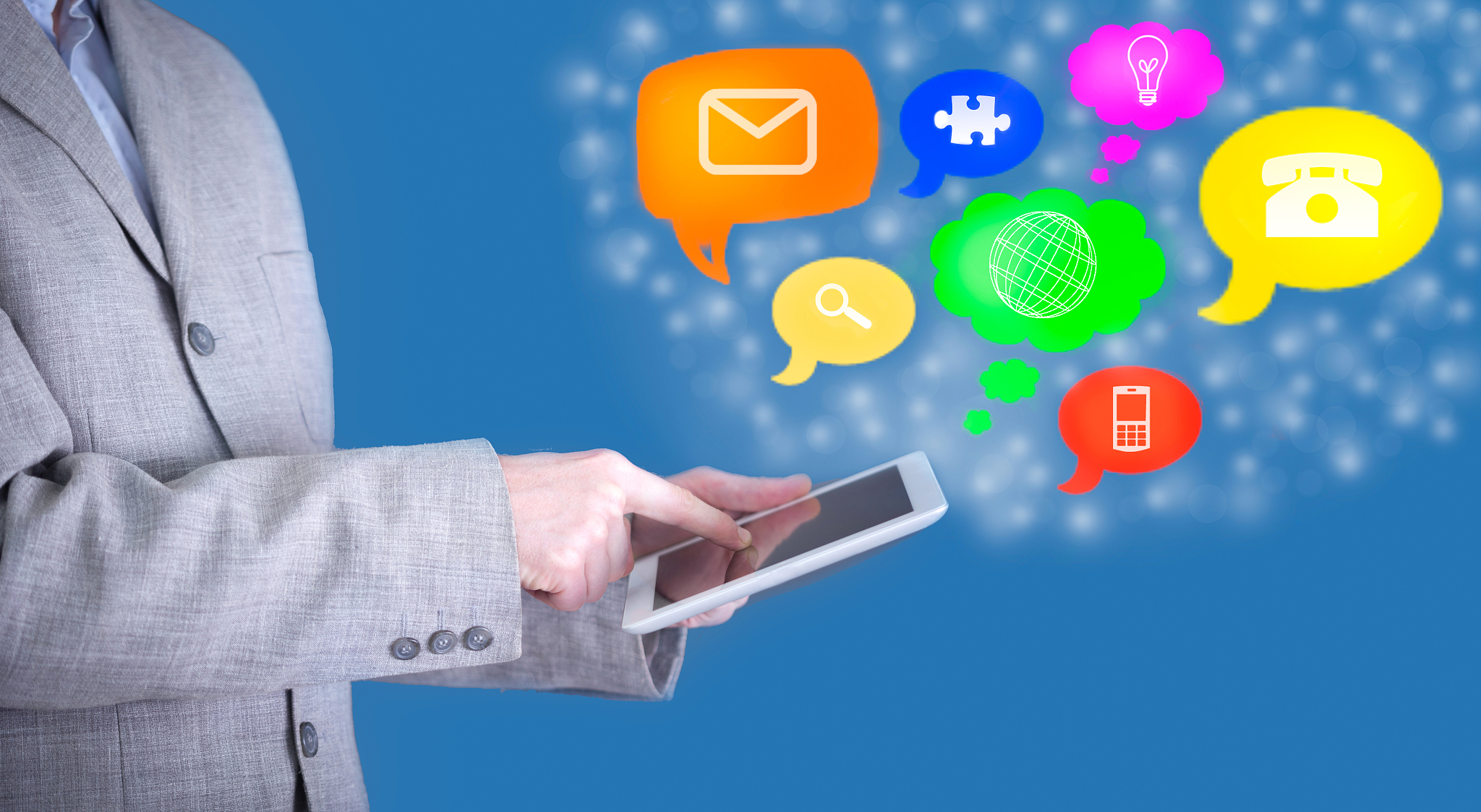 business man use tablet pc with colorful application icons