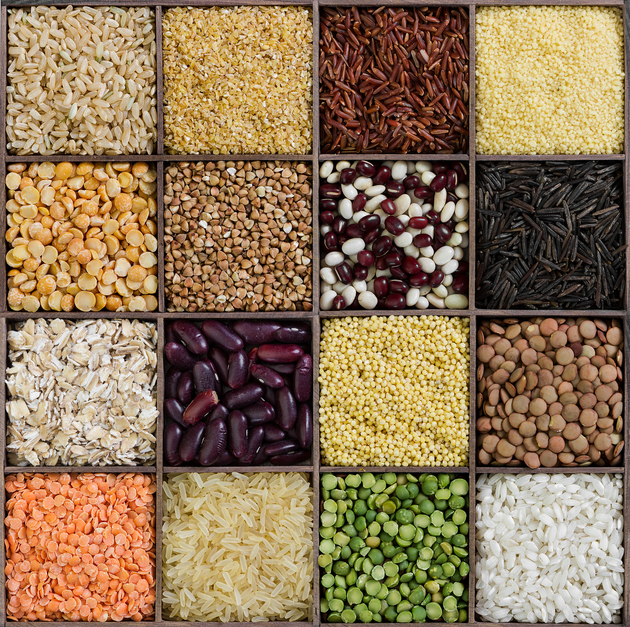 set of different grains in wooden box.