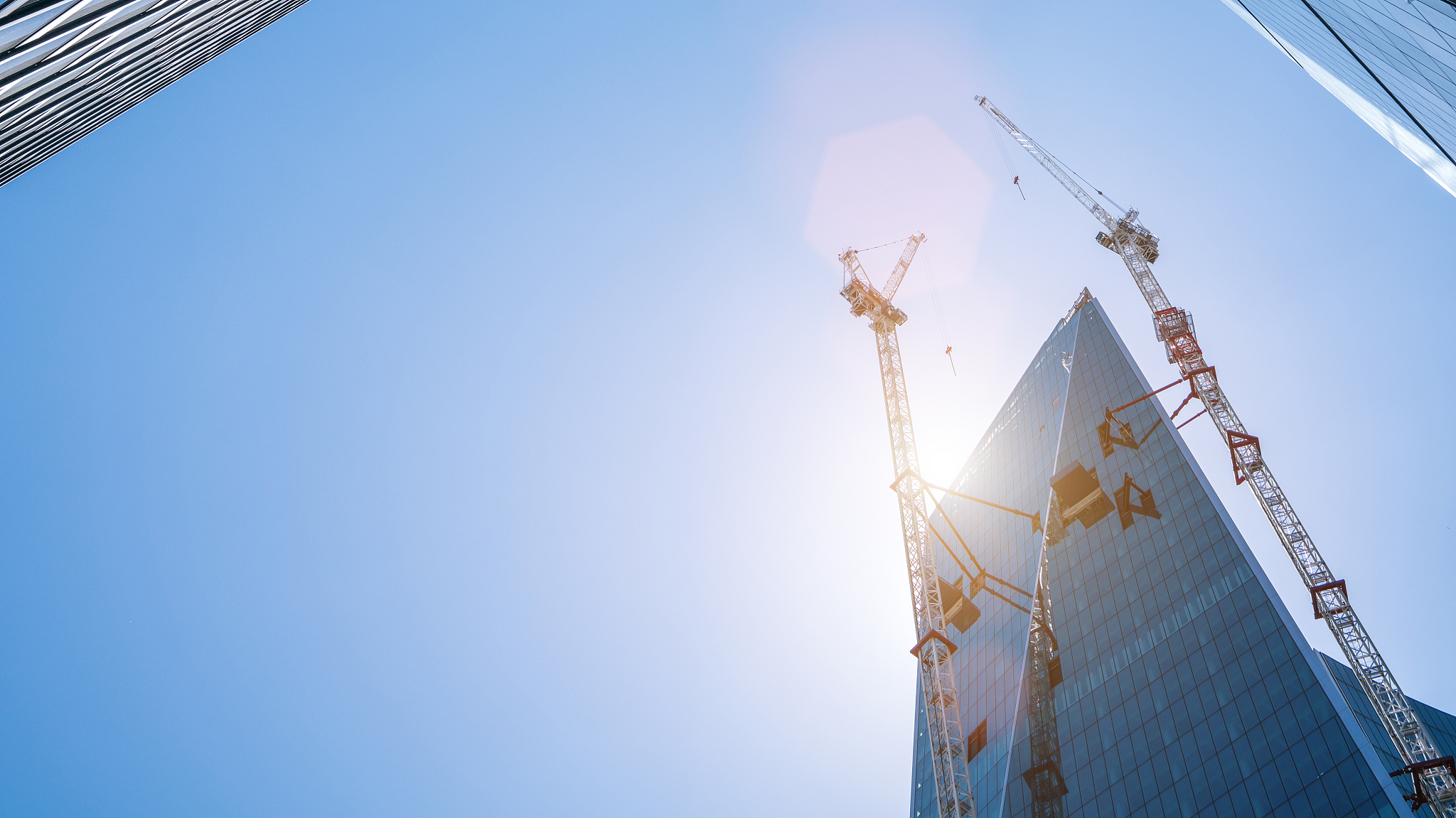 london business buildings at sunrise on a sunny summer day