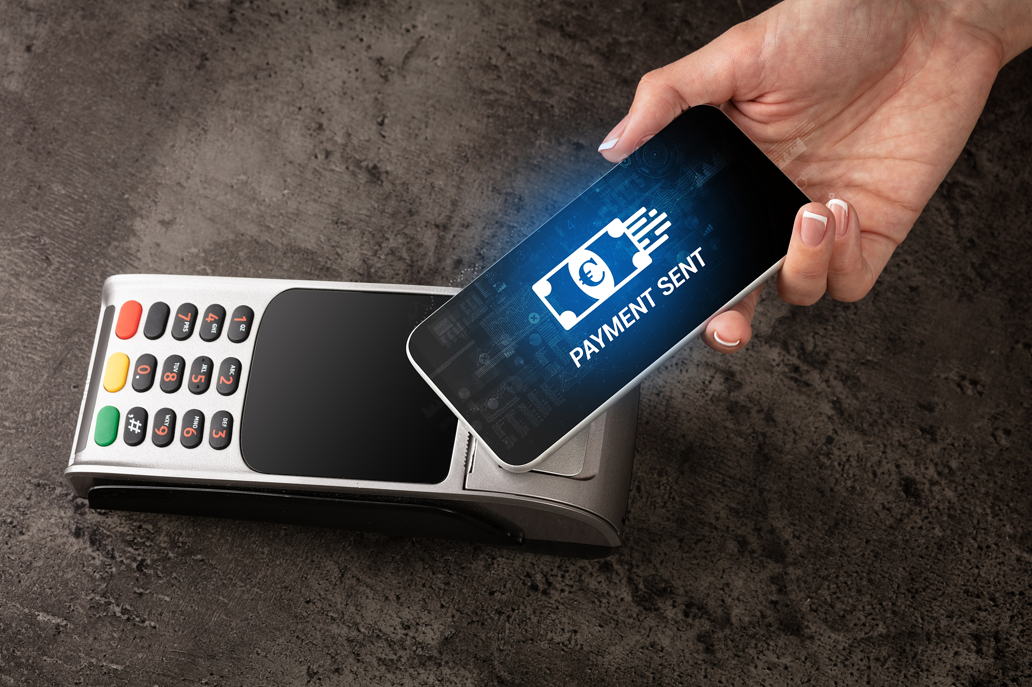 hand paying with bitcoin