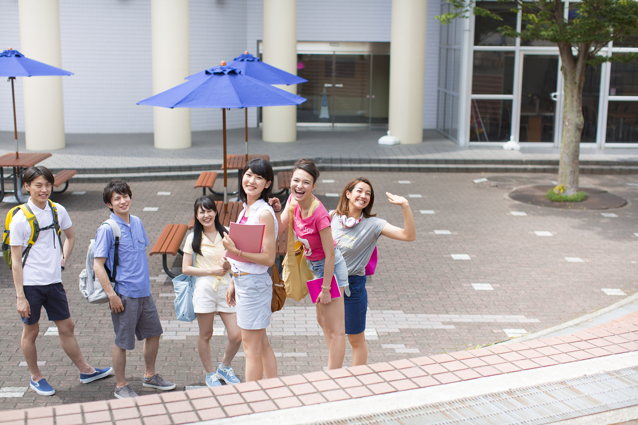 portrait of six college students in campus
