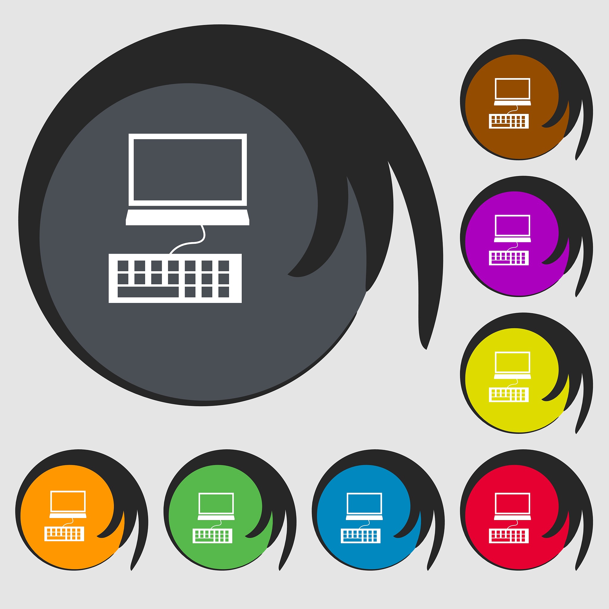 computer monitor and keyboard icon. symbols on eight colored but