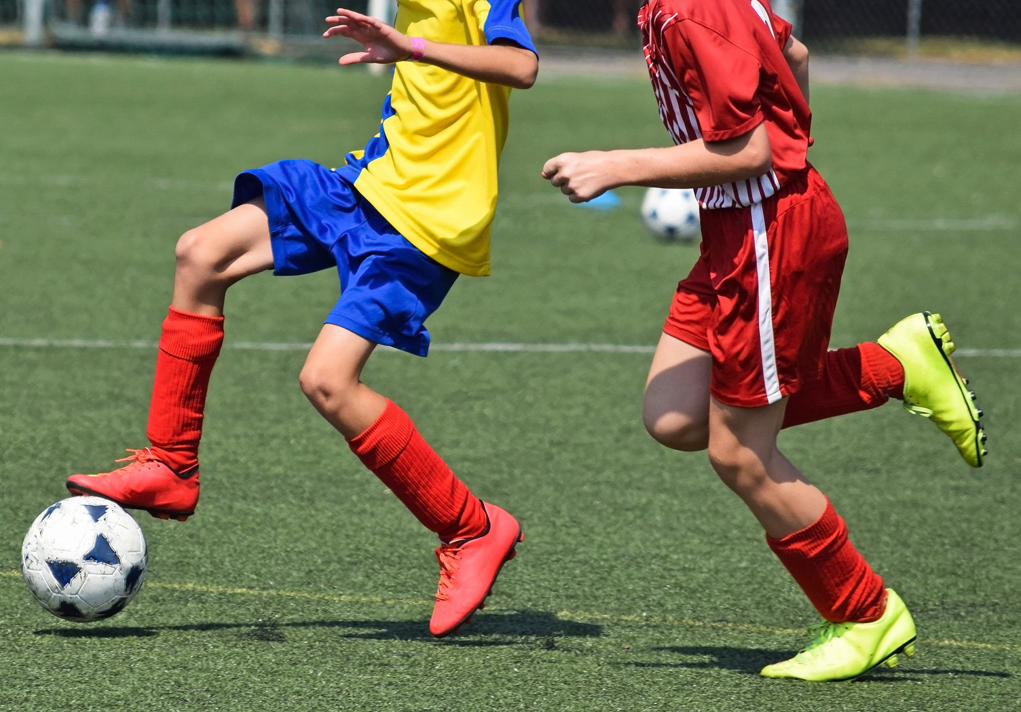 children are playing soccer