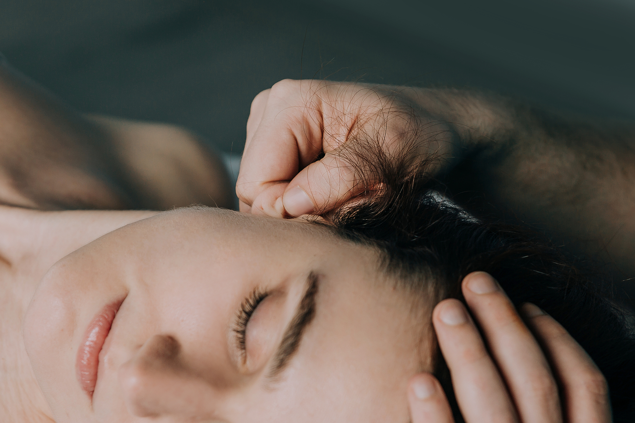 massage women's earlobe. acupuncture point.
