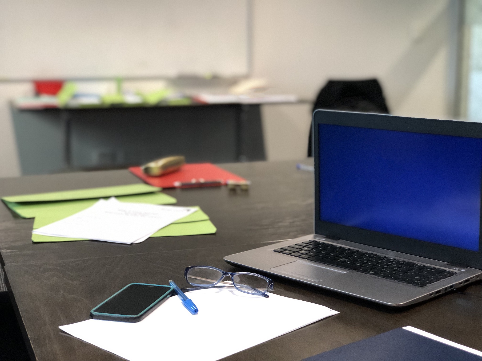 laptop at a work desk