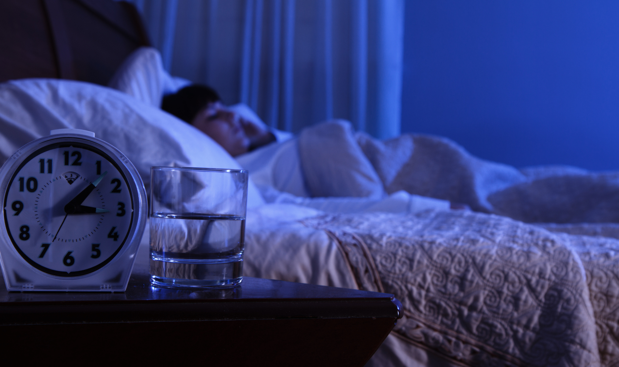 woman sleeping alone at night