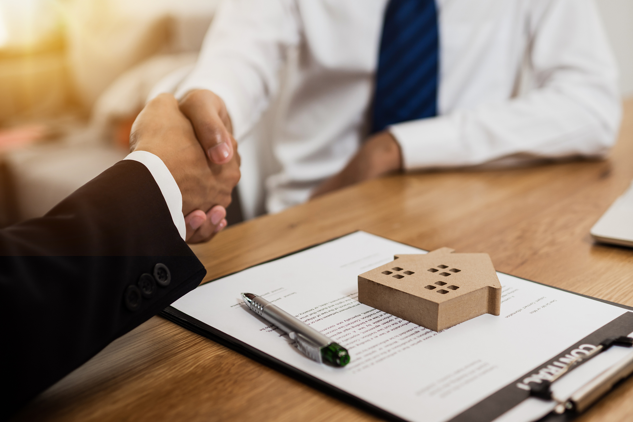 real estate concept, business man shake hands with banker agency