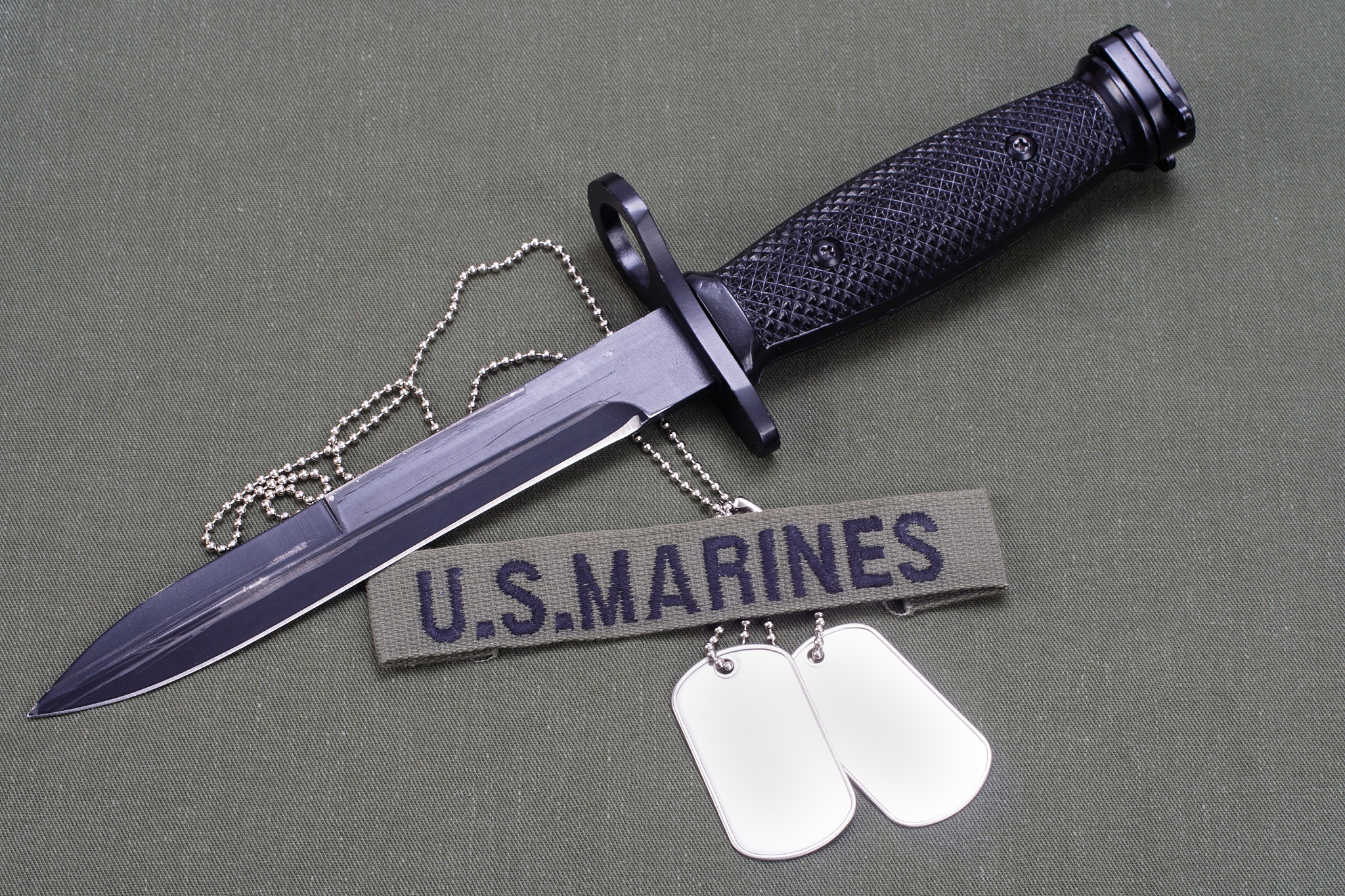 bayonet and dog tags on us marines uniform