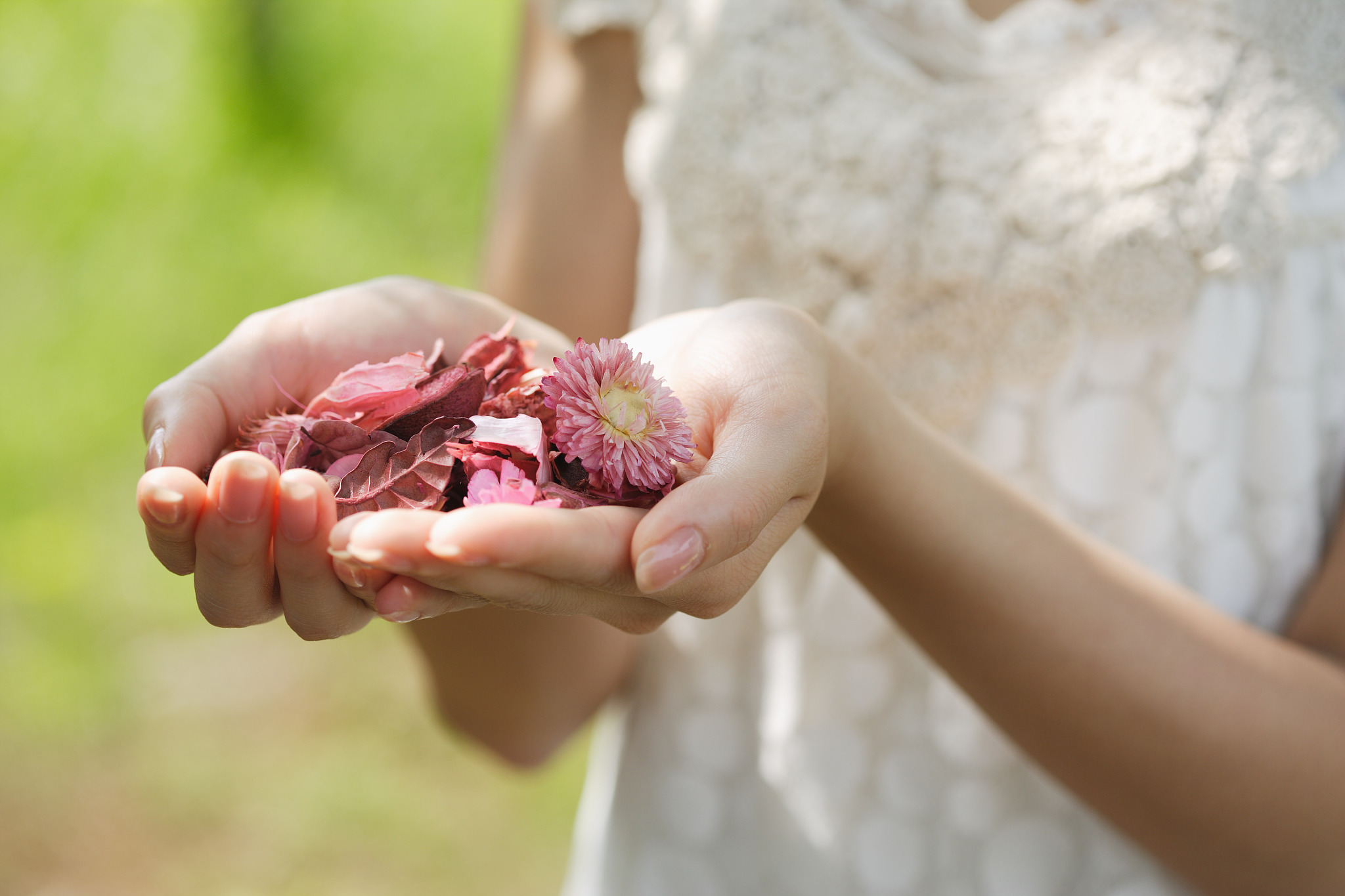 woman holding flowers