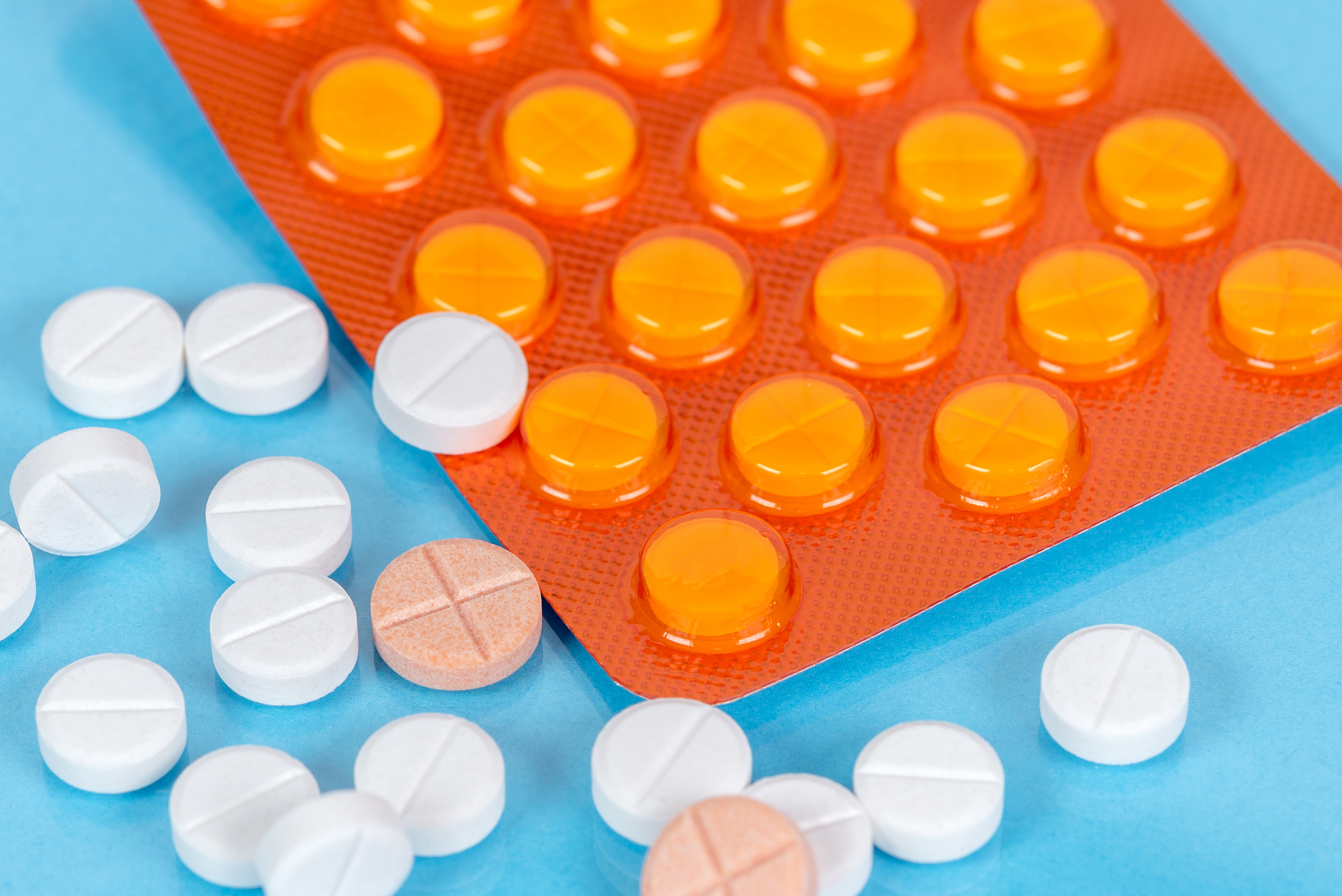 pills and a blister pack on a table