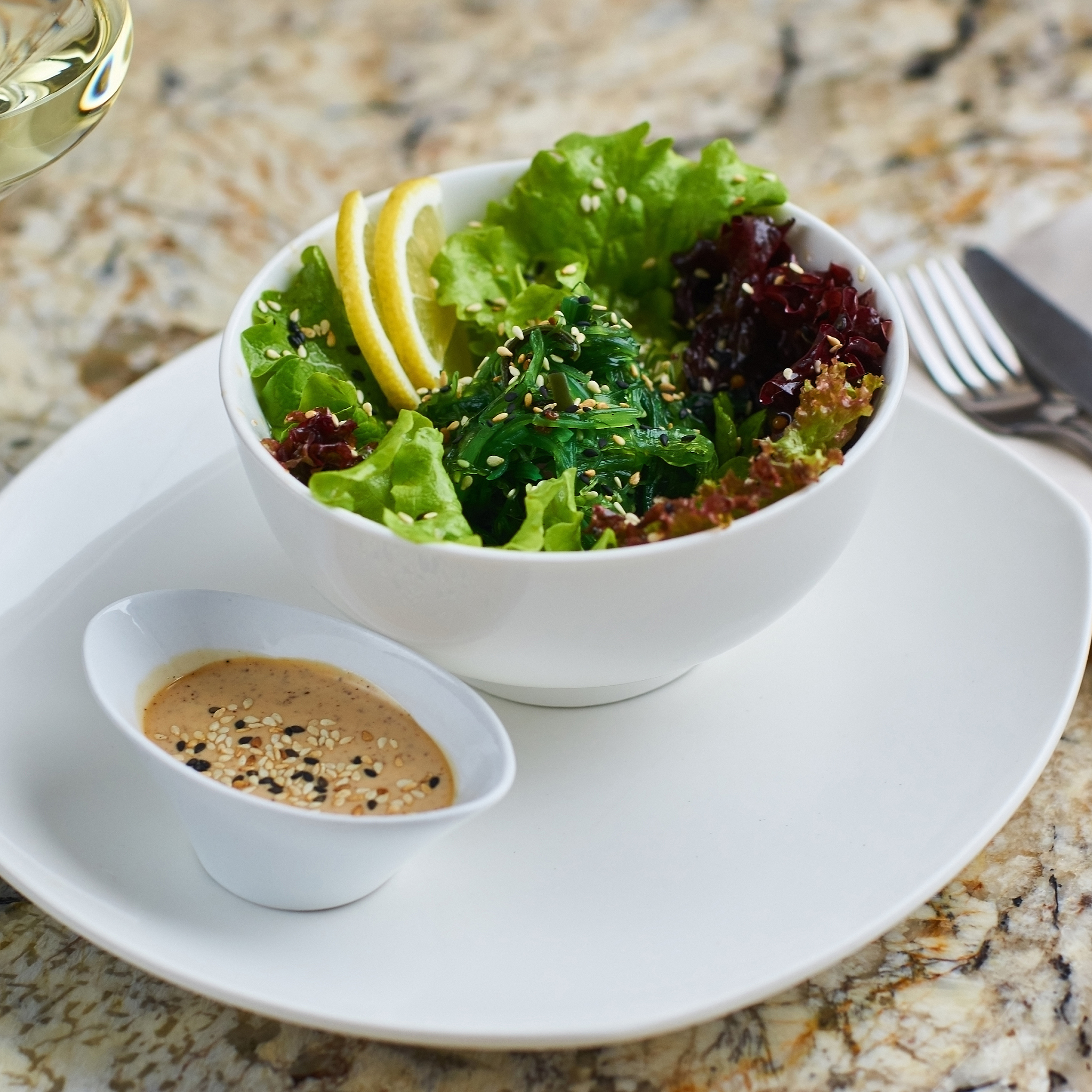 seeweed salad in white bowl