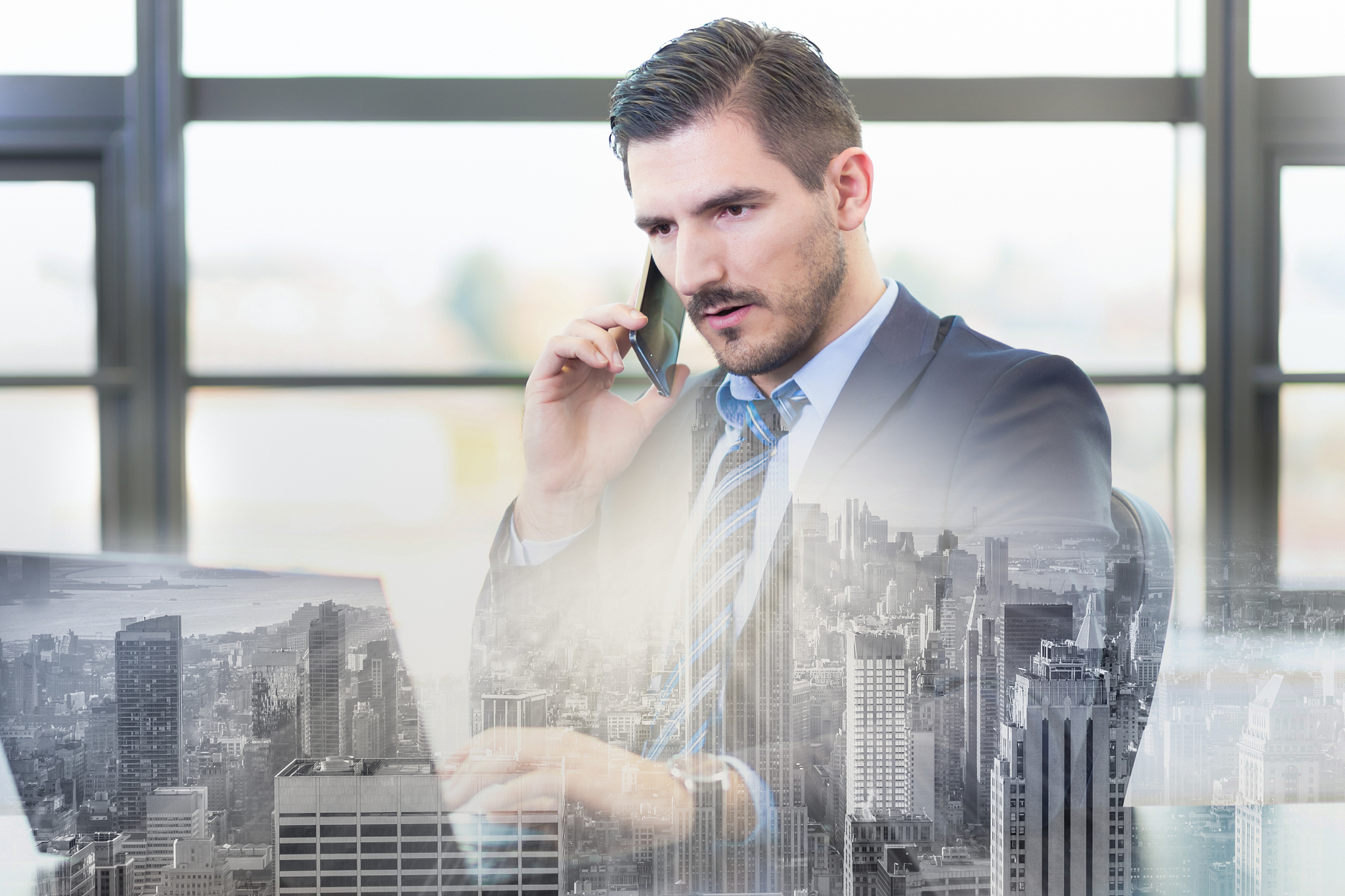 businessman in office working on laptop computer.
