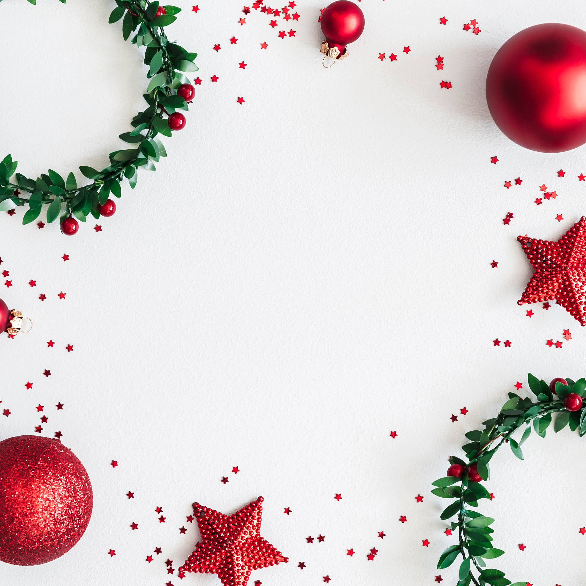 christmas composition. wreaths, red decorations on pastel gray b
