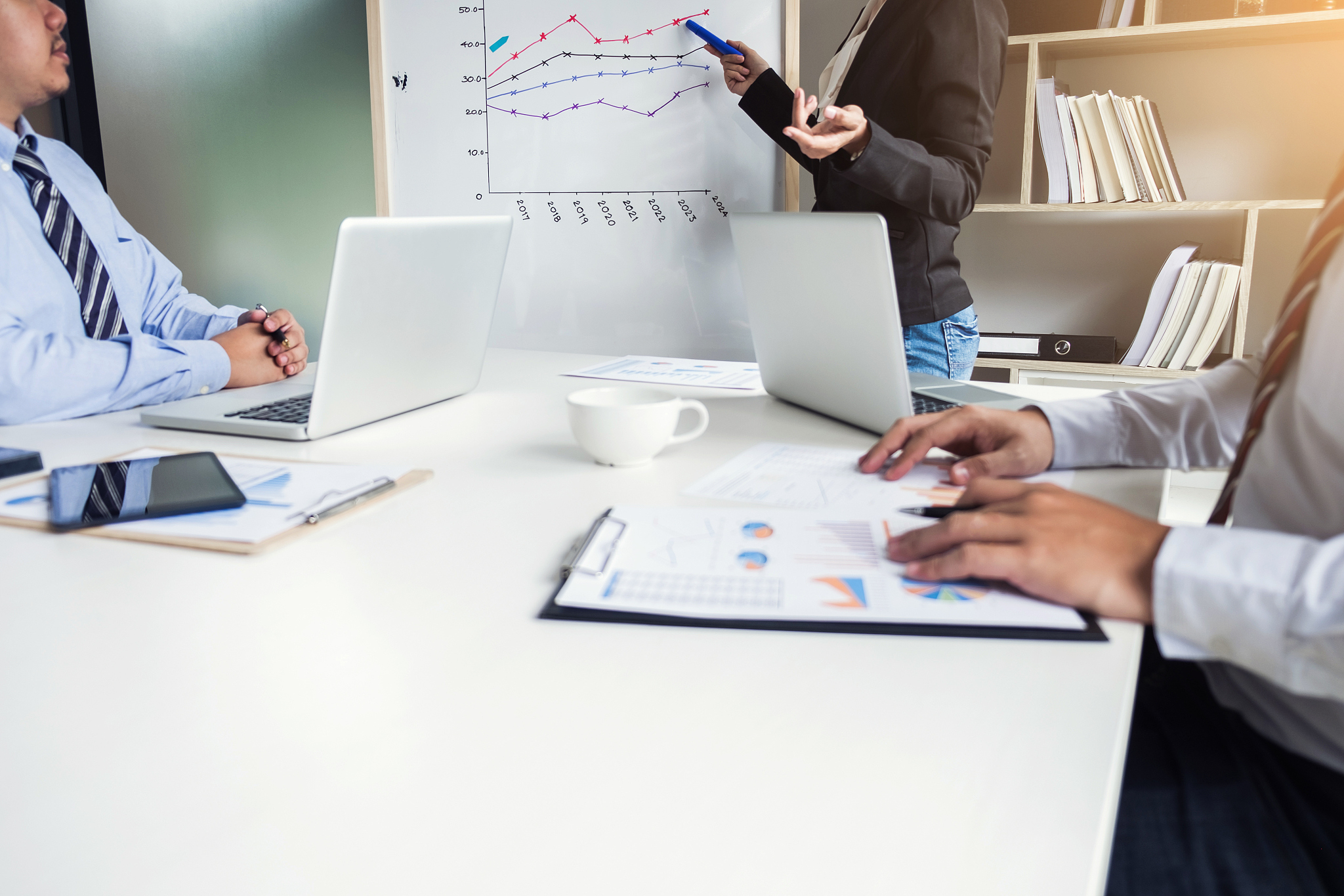 business people are working in office, presentation in front of 