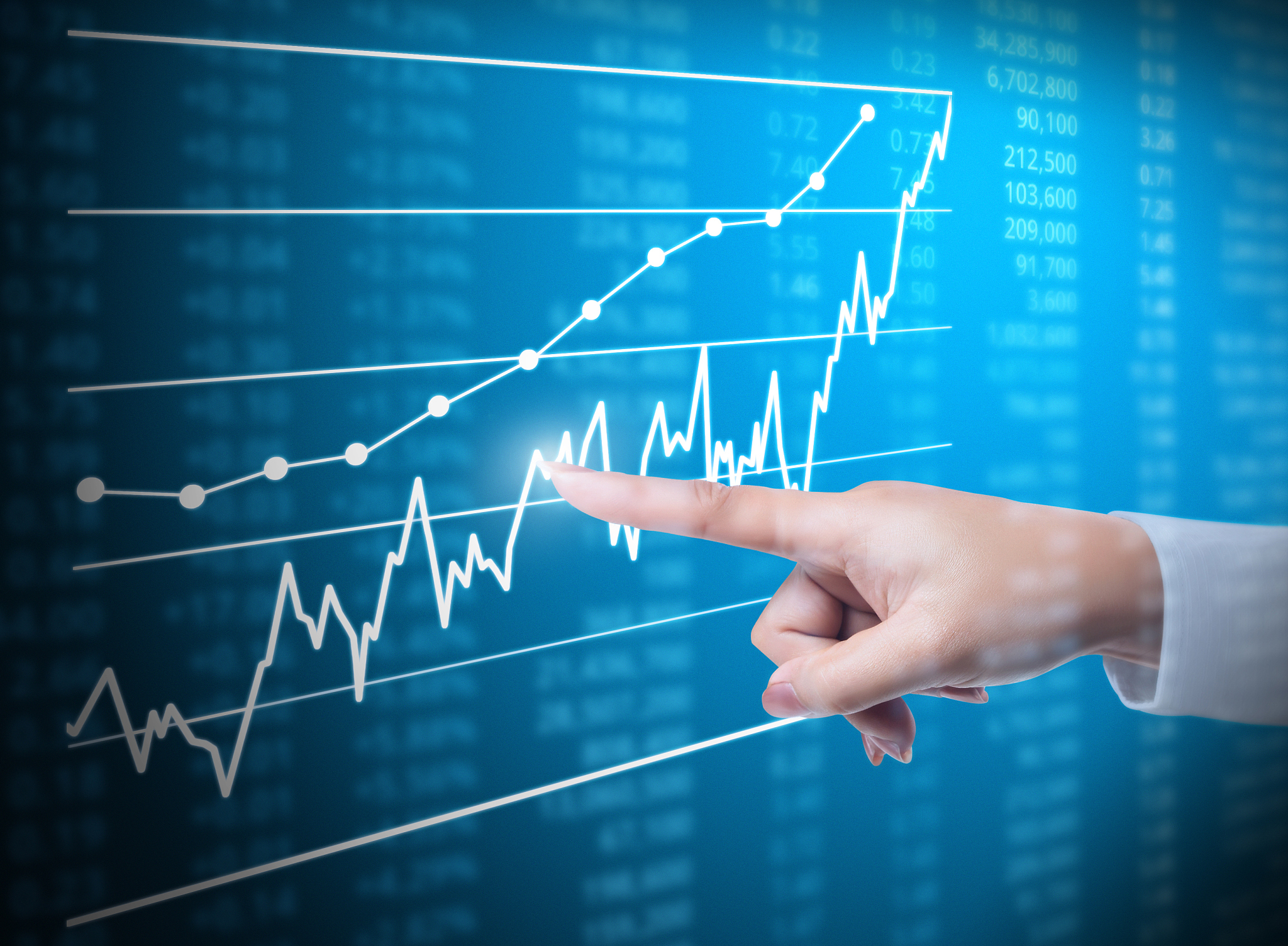 hand with financial chart symbols coming from hand