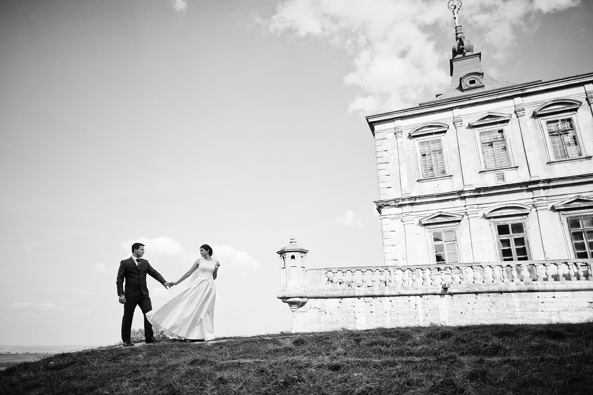 young wedding couple on background old castle