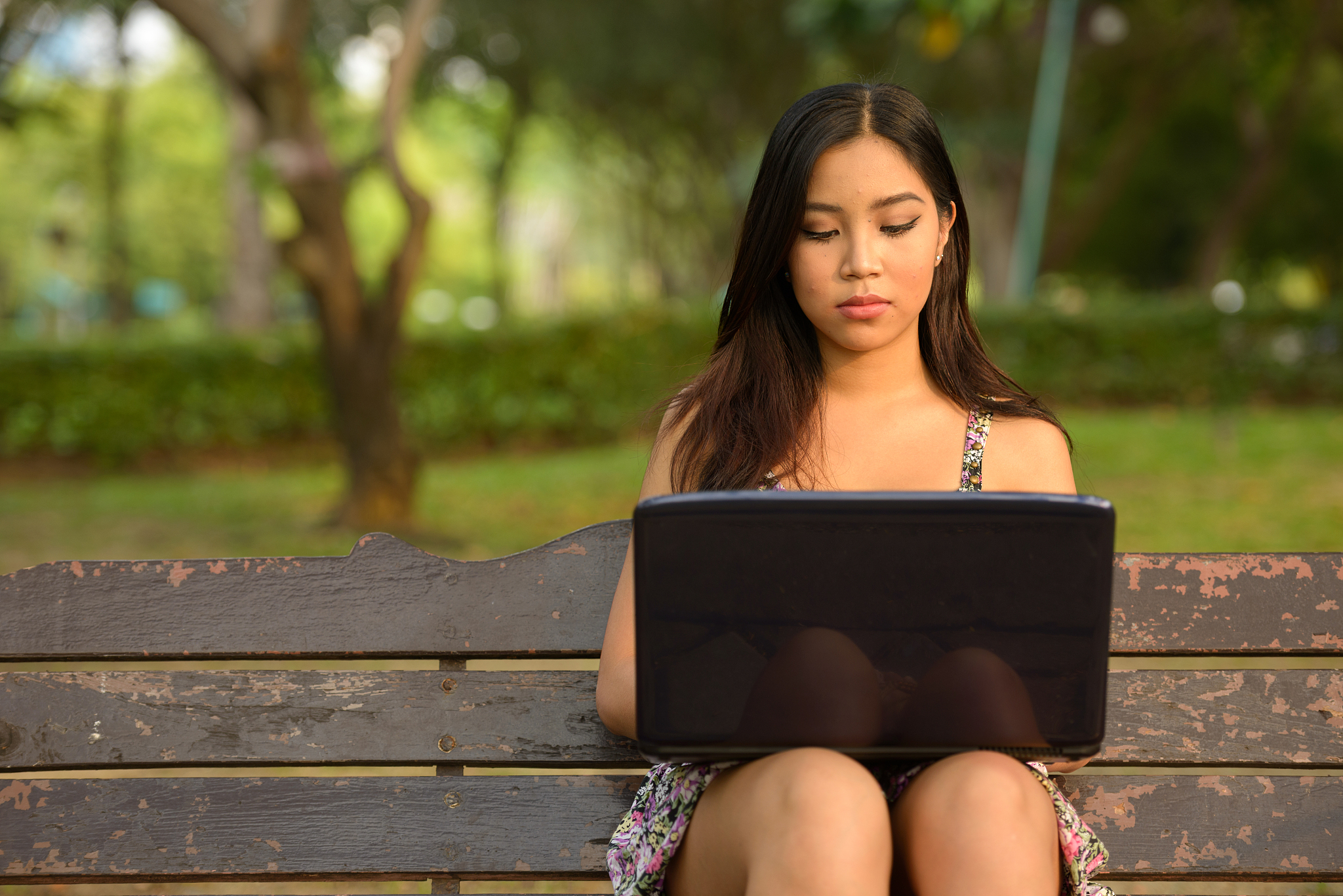 asian teenager girl using computer