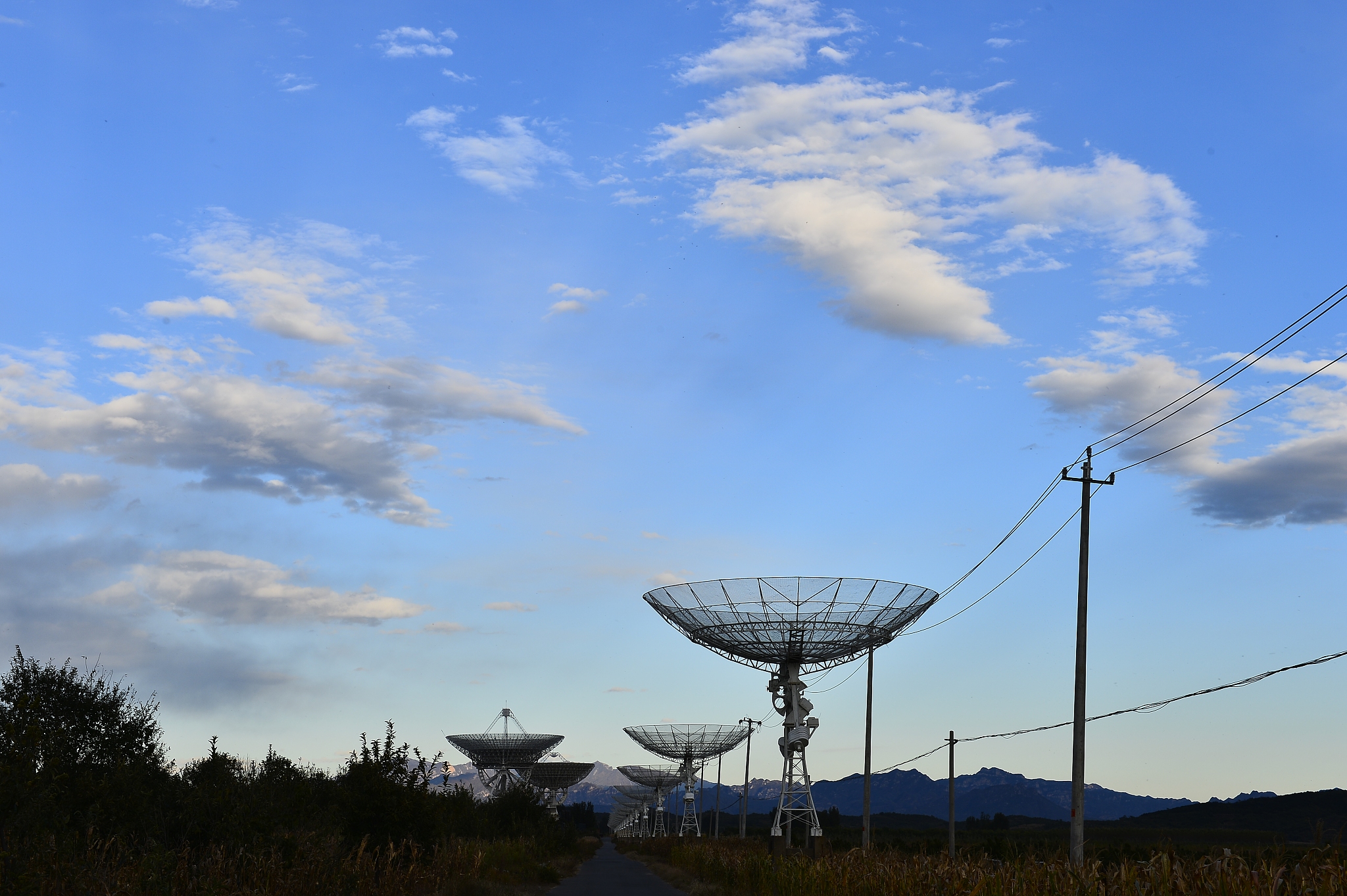 the observatory in the evening,the silhouette of a radio telesco