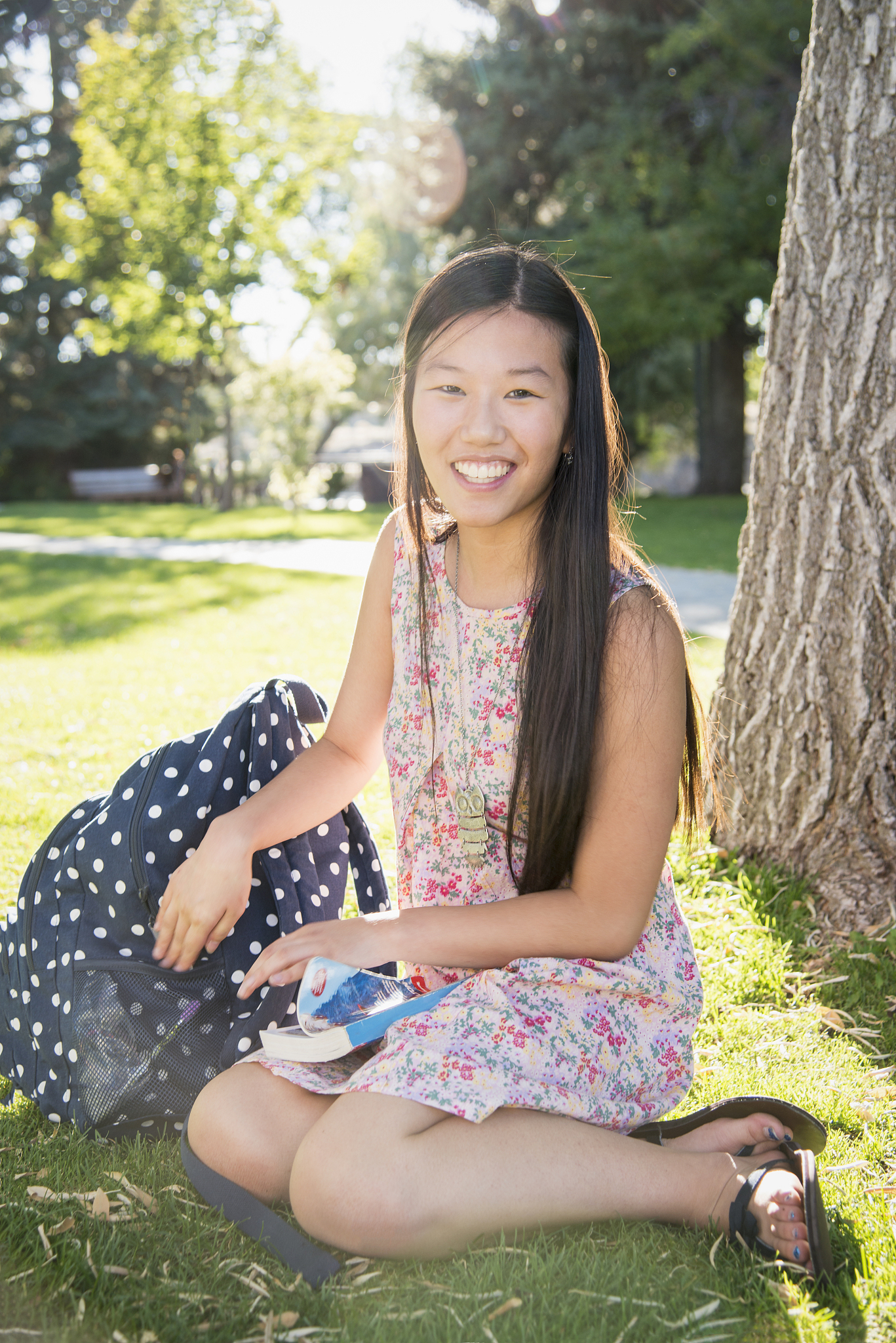 teen girl studying outdoors