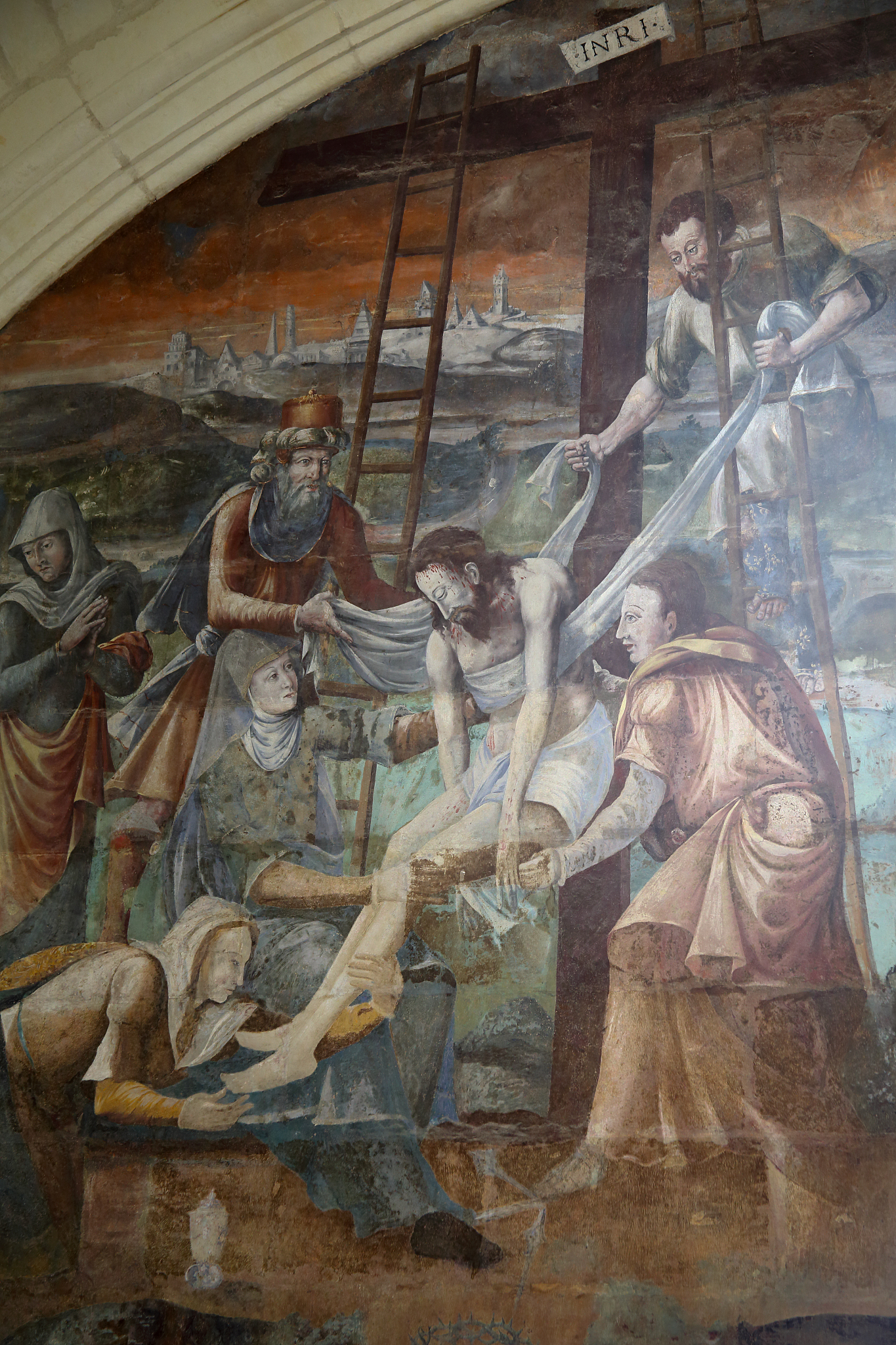 fresco of christ's body being taken down from cross