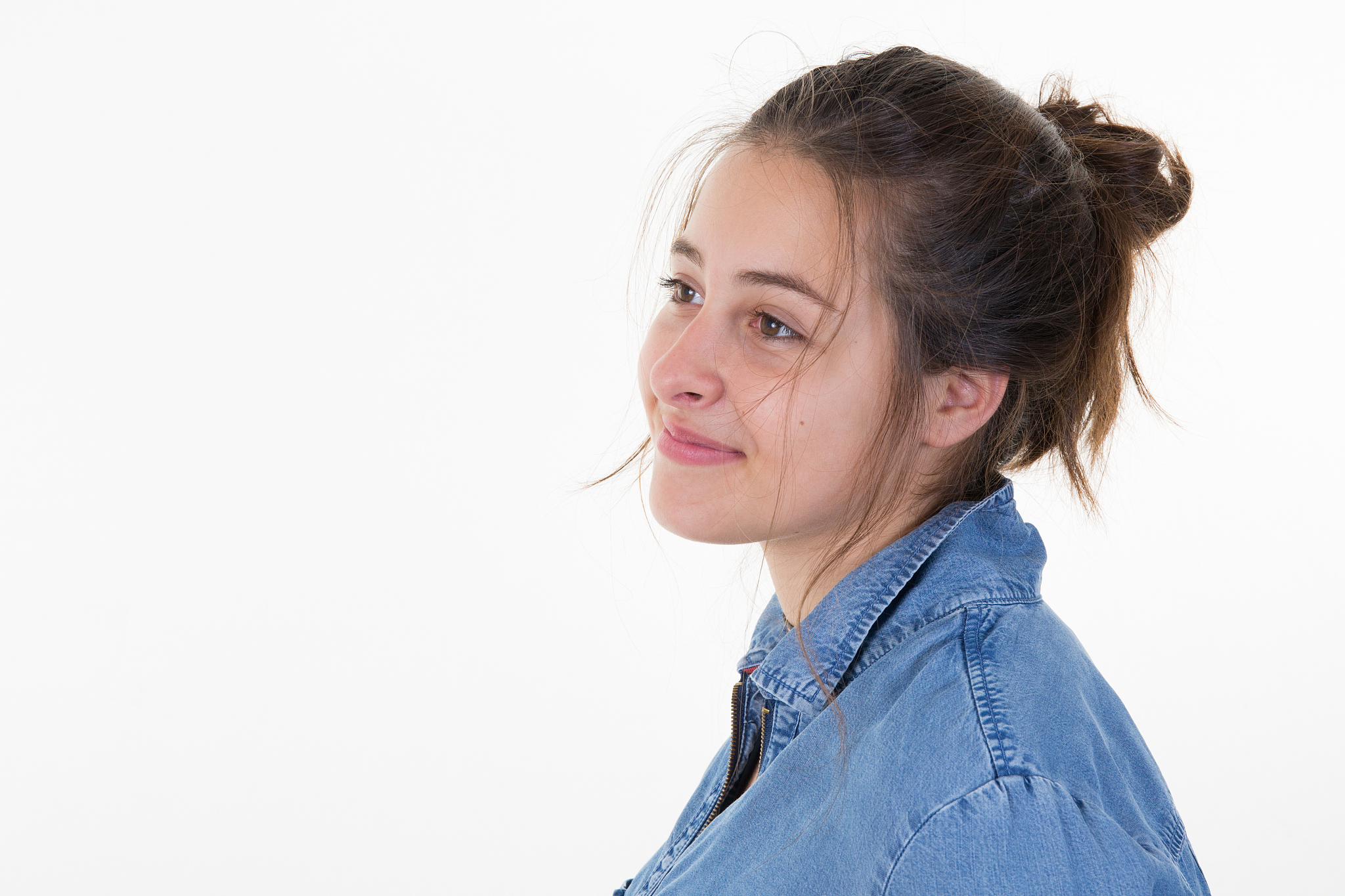 young student woman posing over white background
