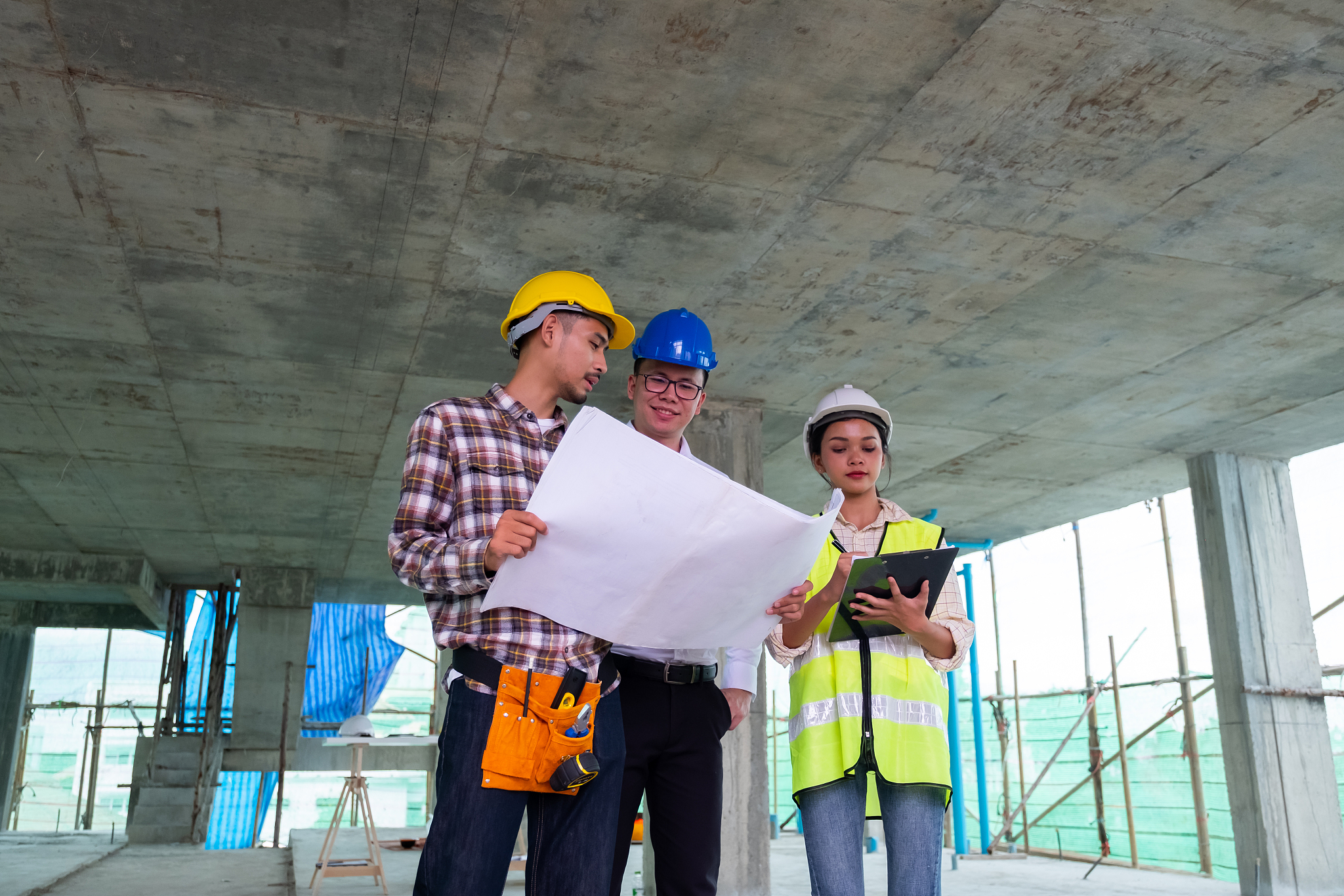 engineers are discussing at building site