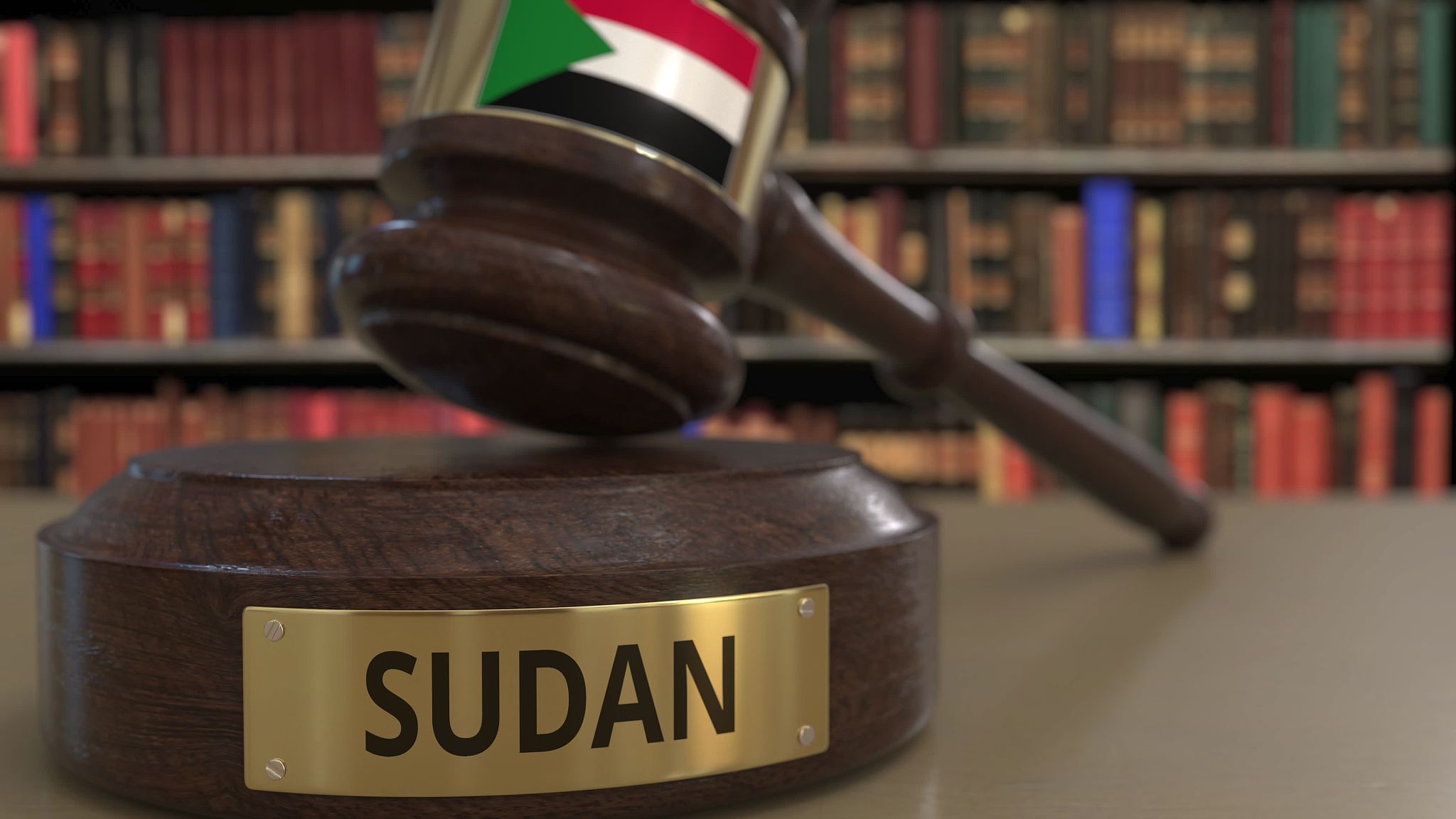 flag of sudan on falling judges gavel in court. national justice