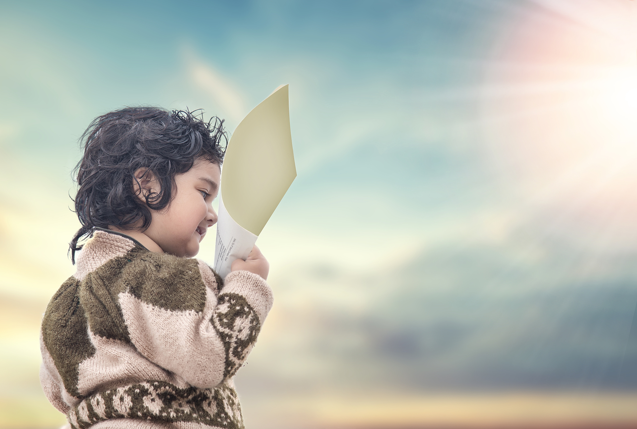 infant girl early-learning to read from books, education inspira