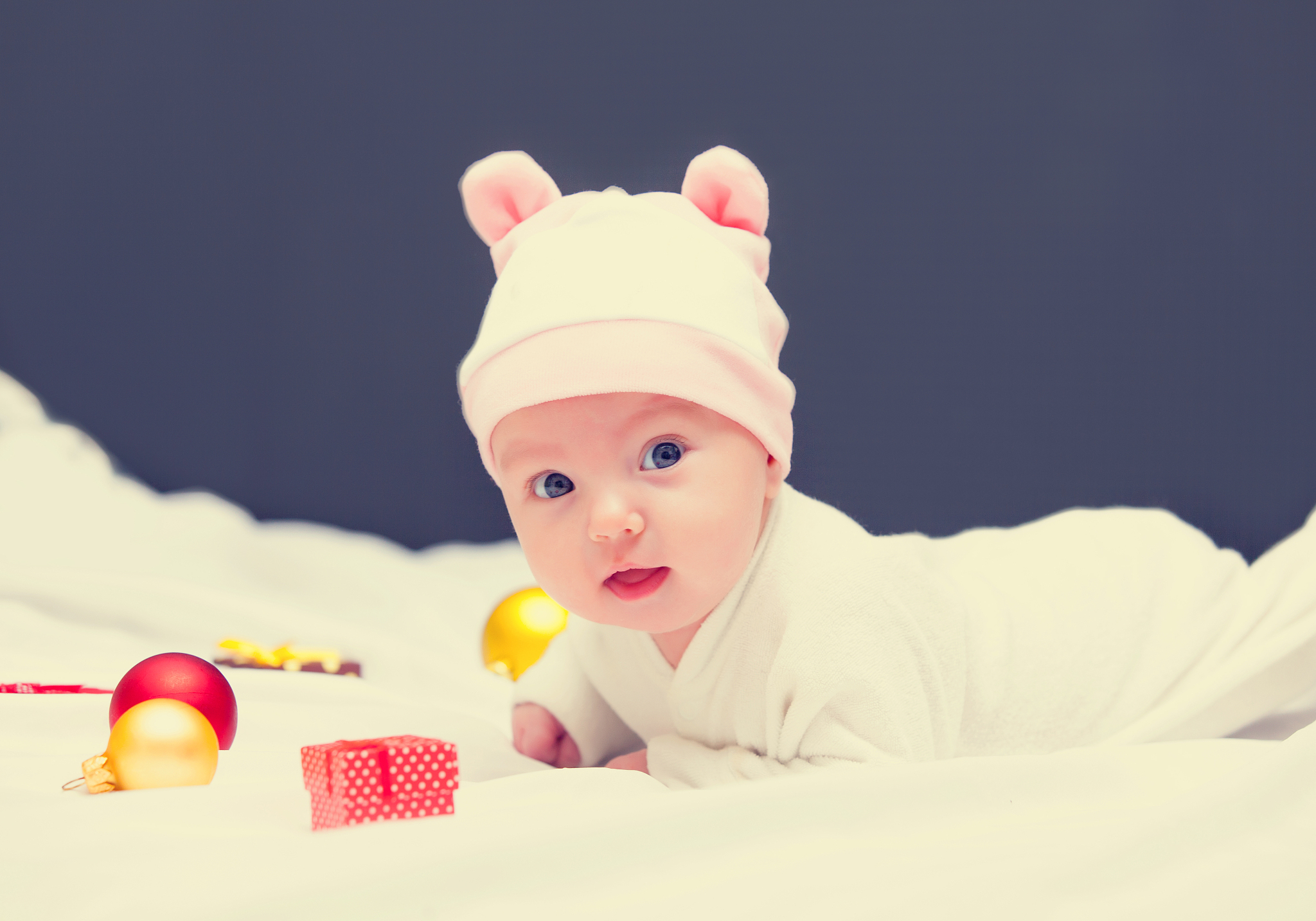 baby with christmas gifts