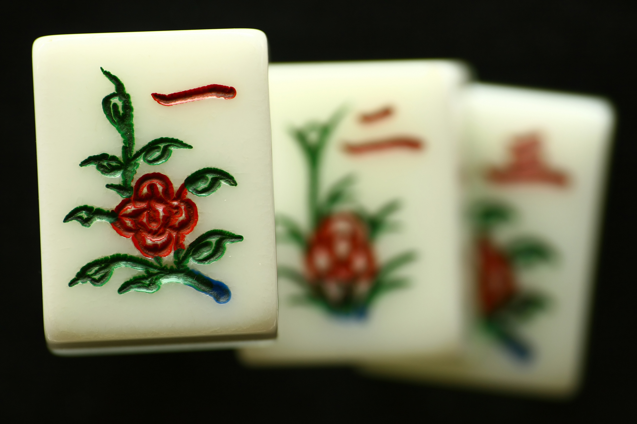 three mahjong tiles