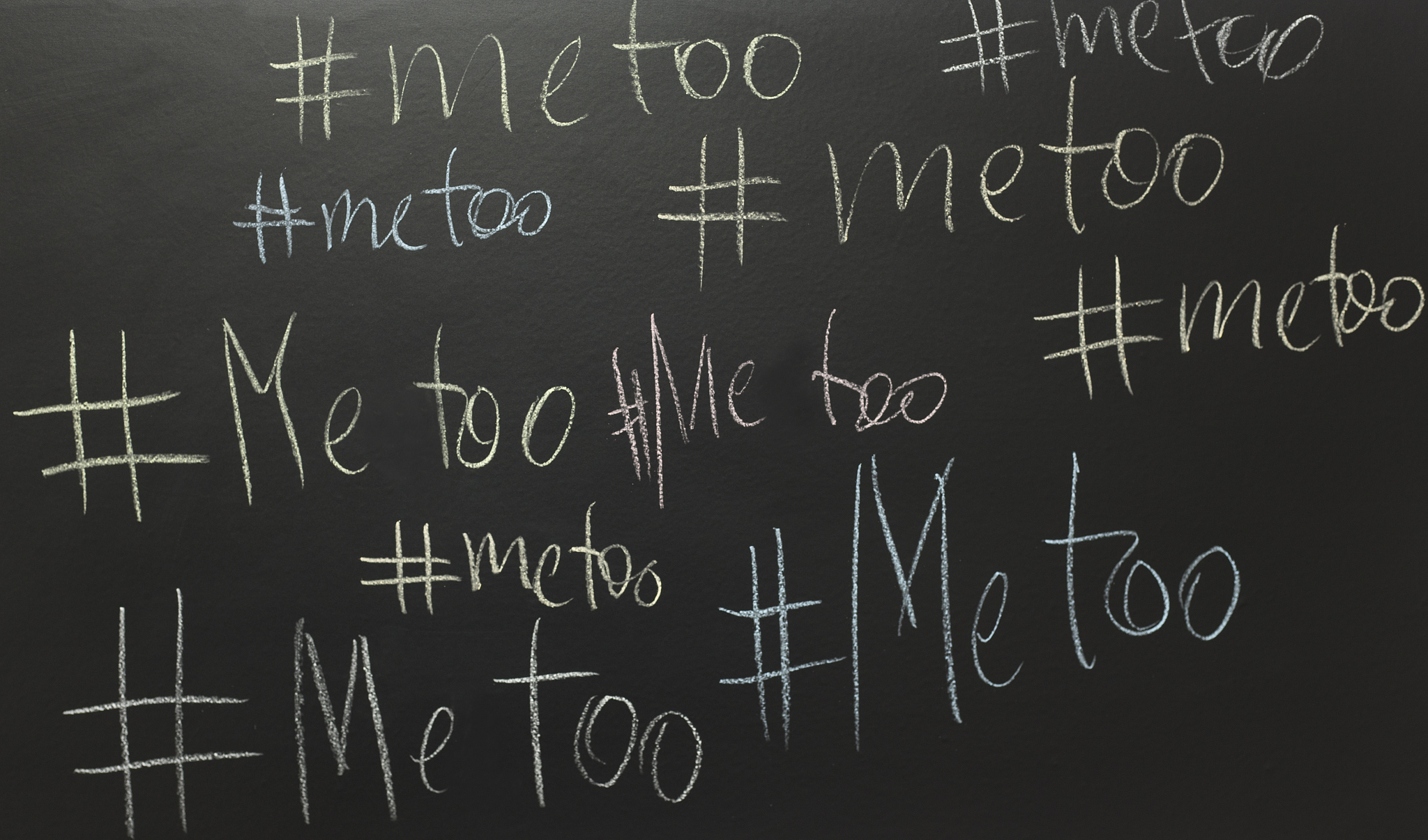 me too written with chalk on blackboard.