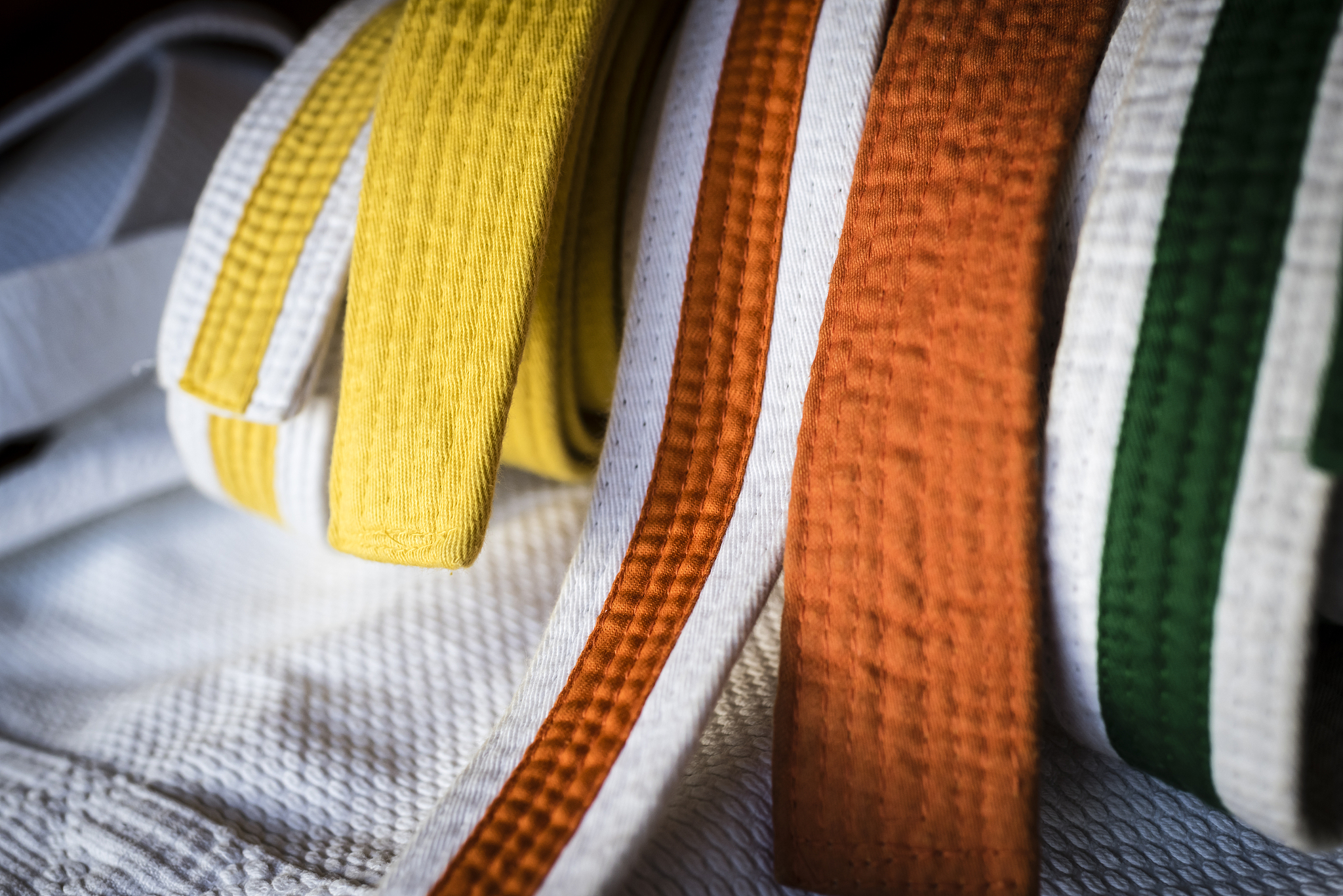 variety of karate belts in different colors