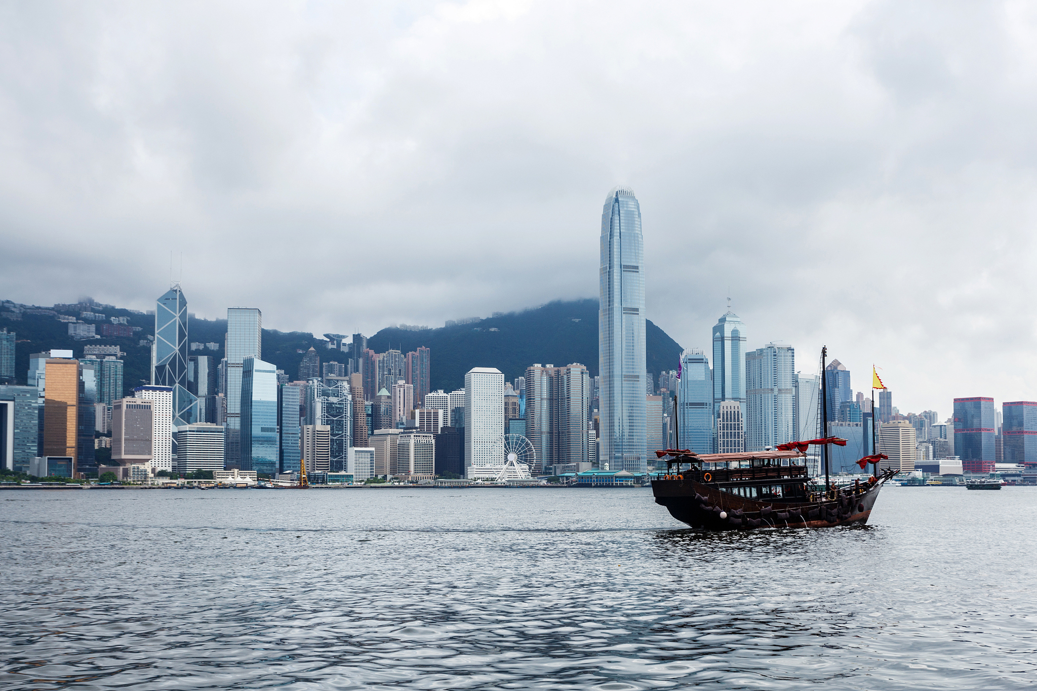 skyline and  buildings in harbor of hong kong