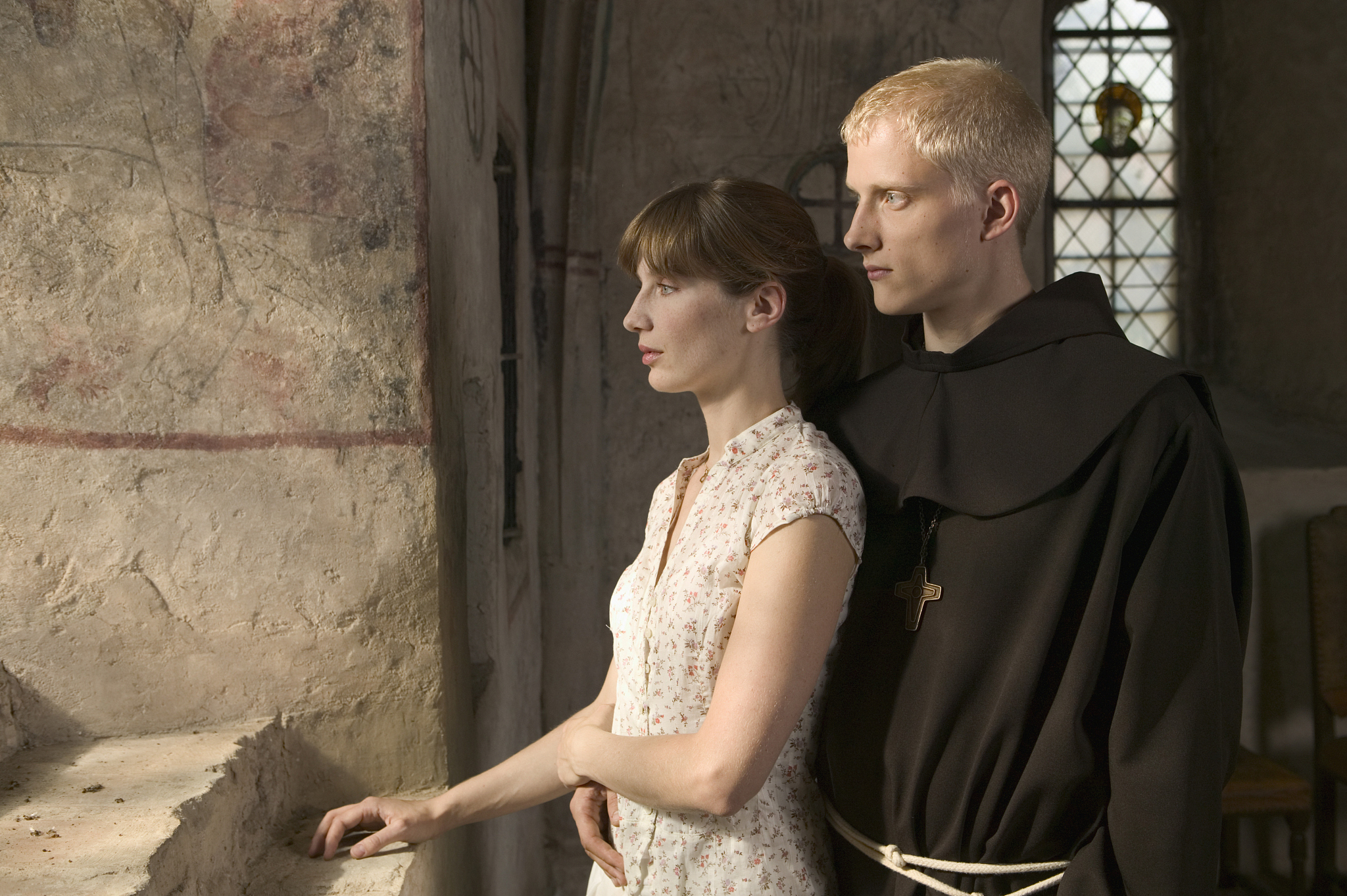 clergyman and woman in church