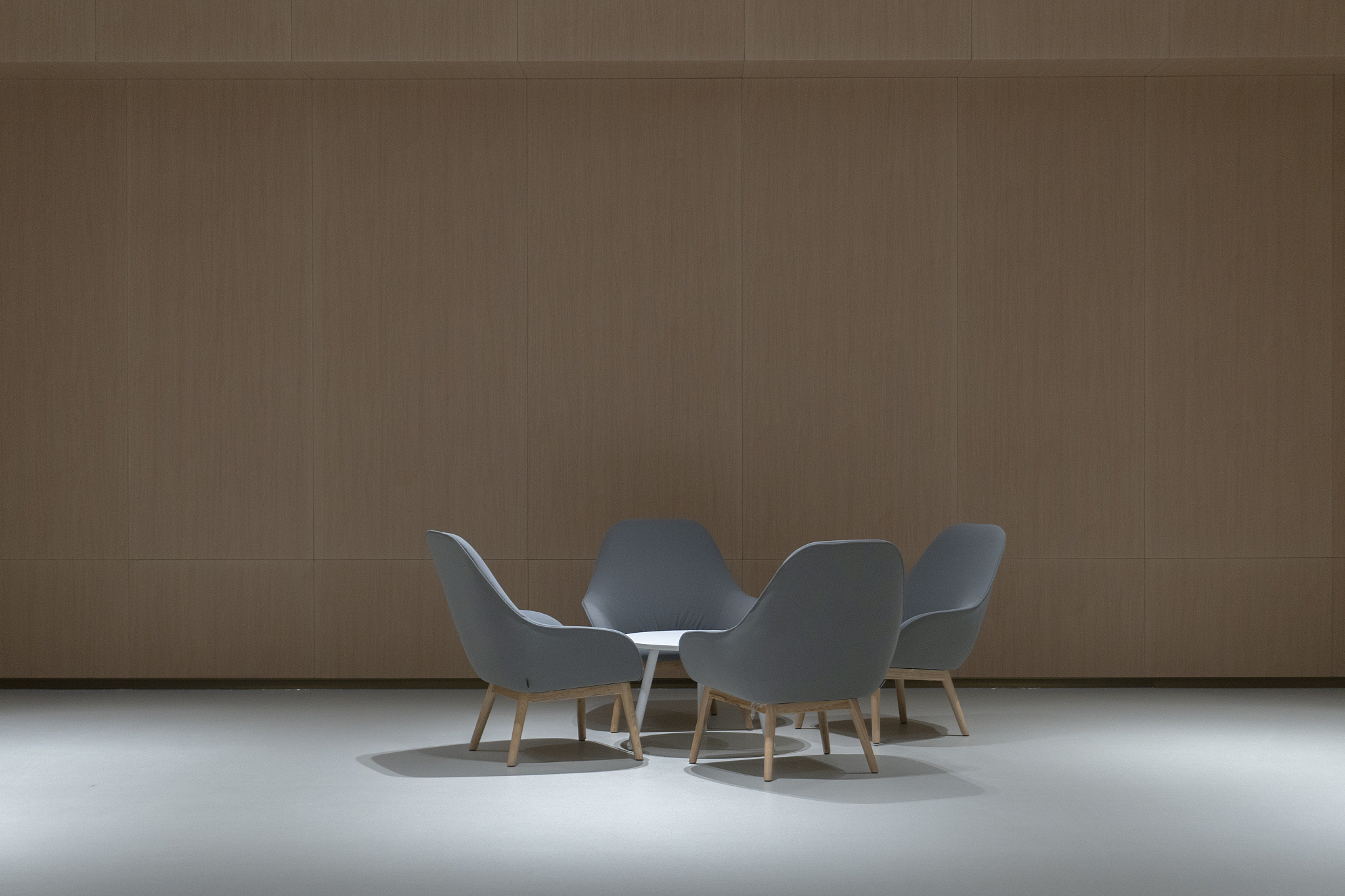 sofa chair and round table in the hall