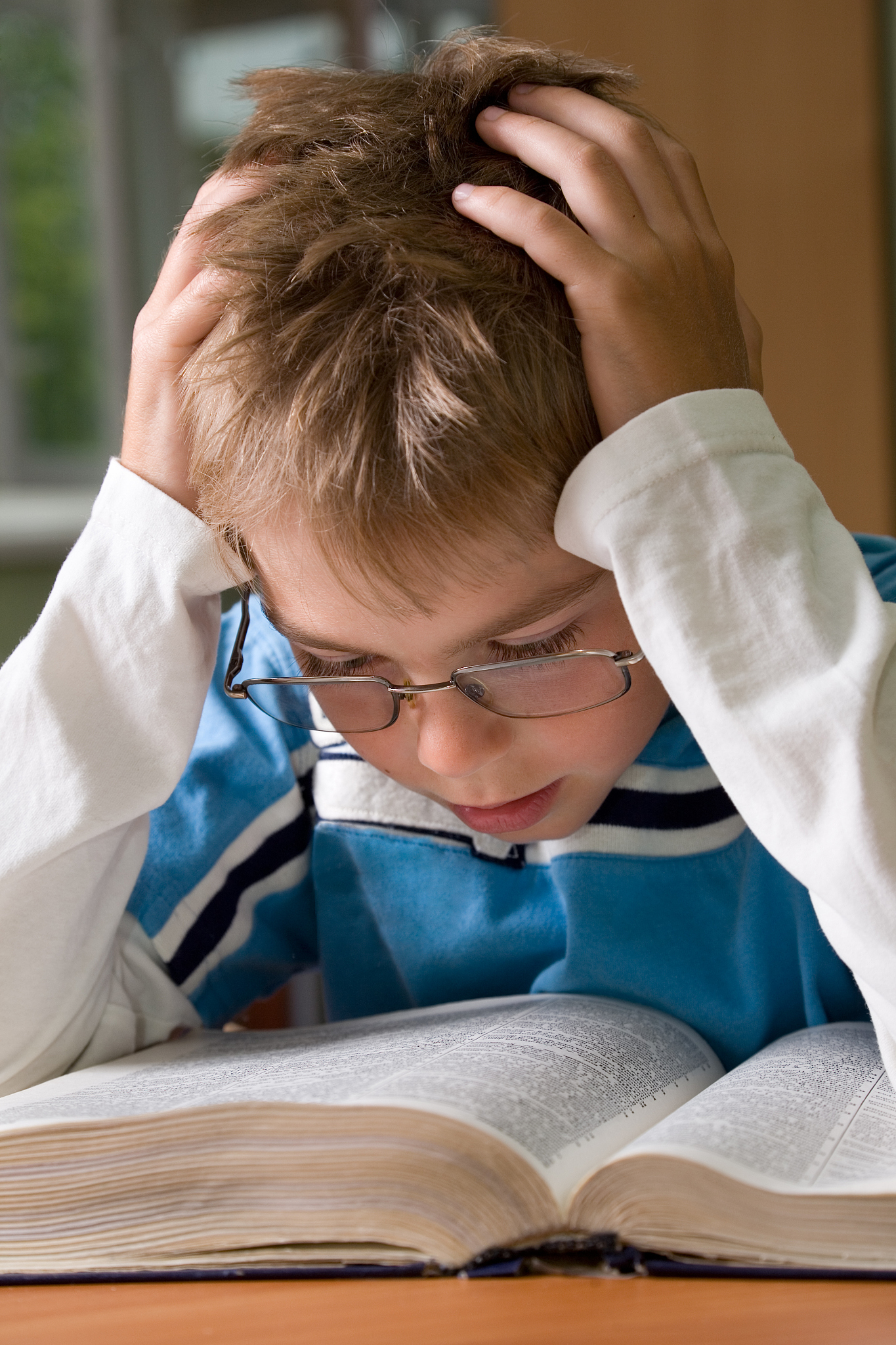 boy reading a book