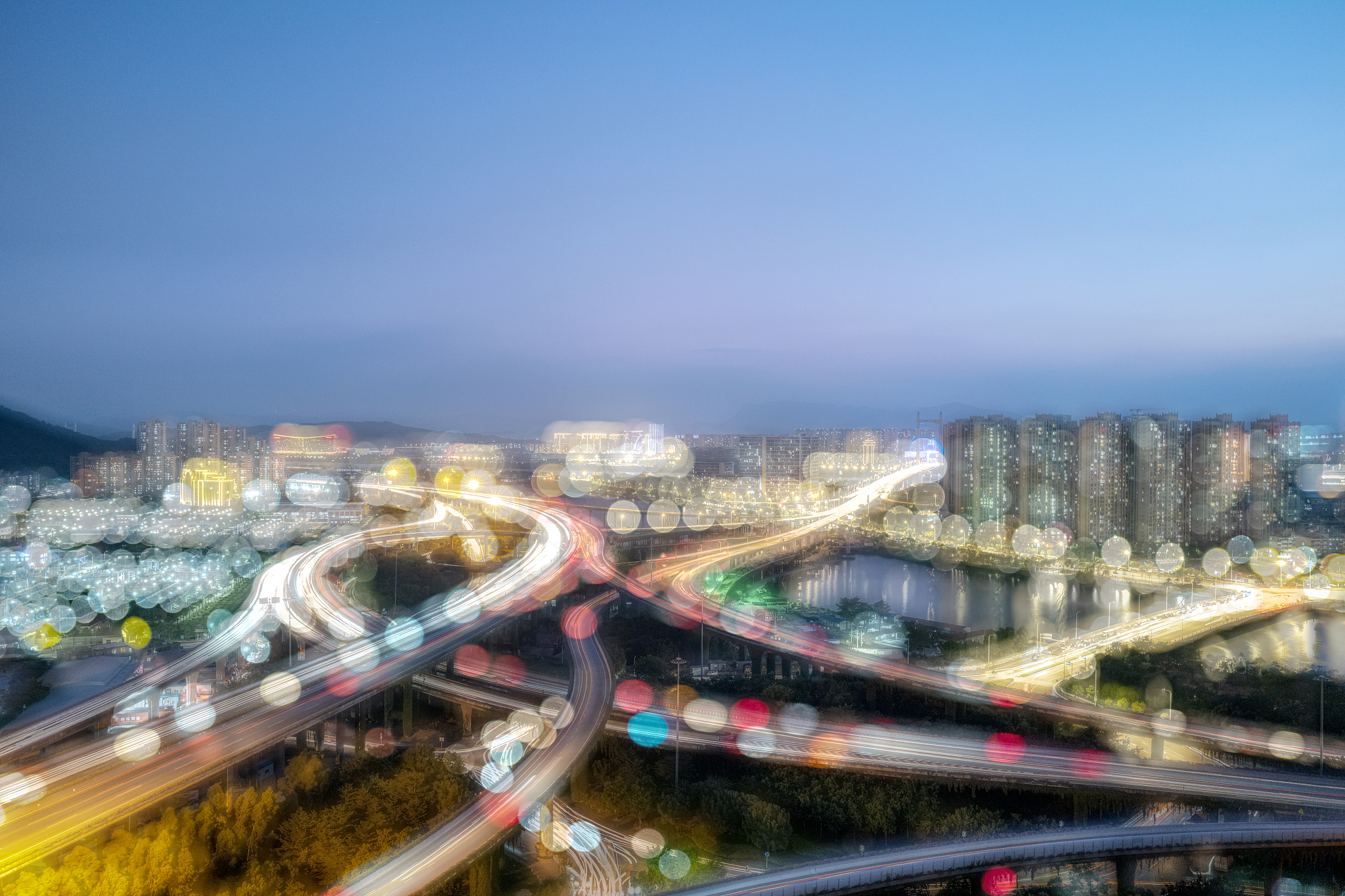 night scene of modern city traffic with charming light spots