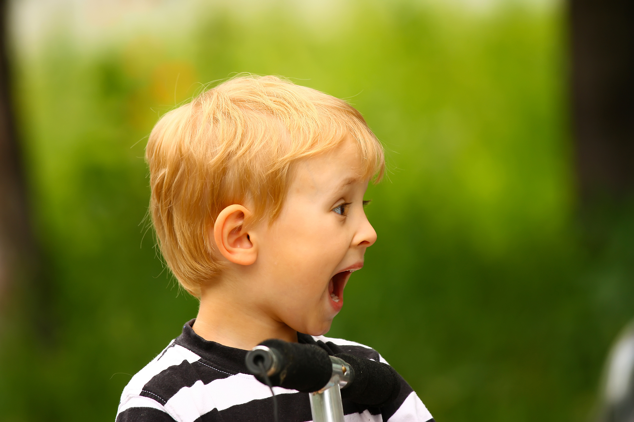 surprised blond boy with mouth open