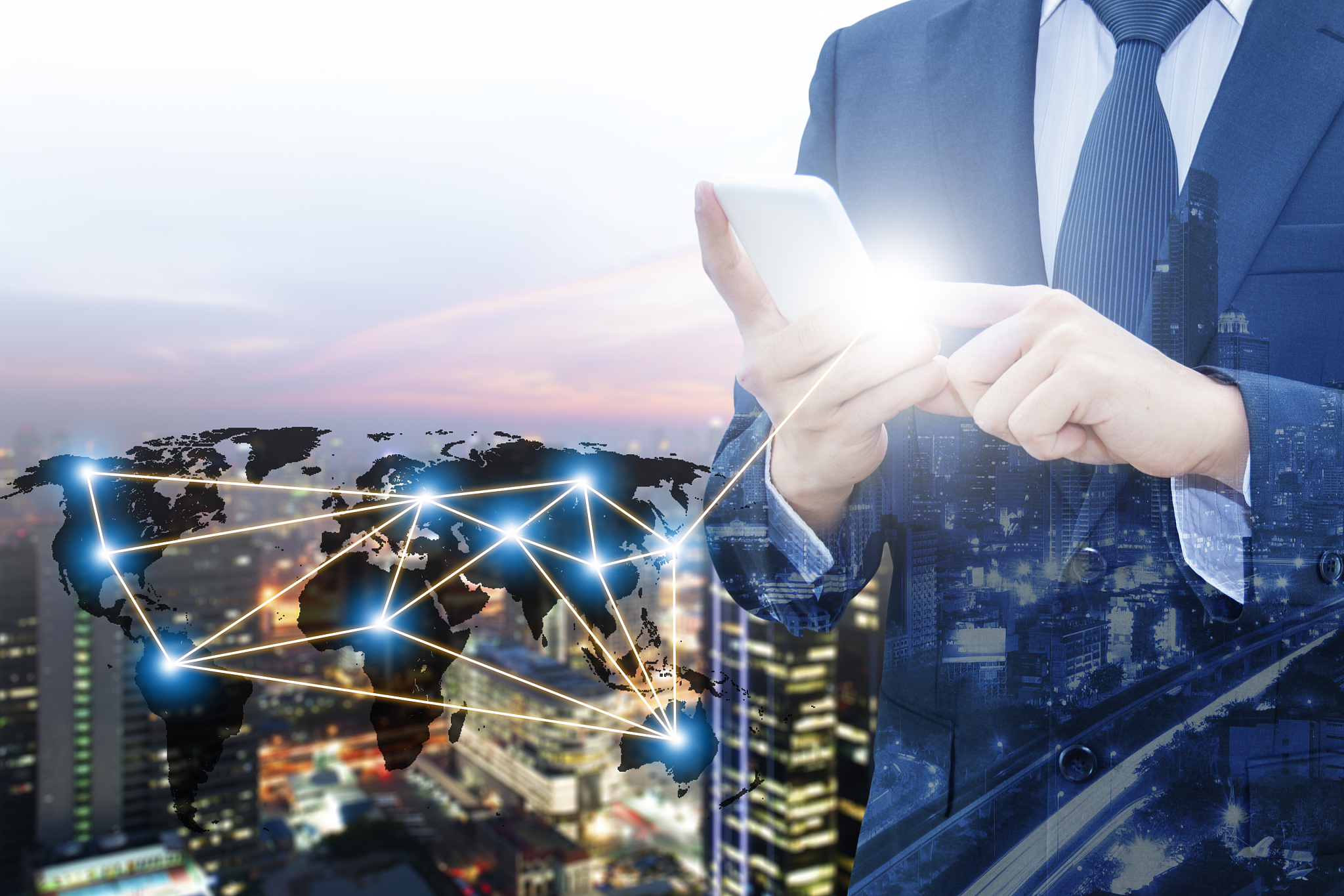 double exposure of businessman using smart phone network connect