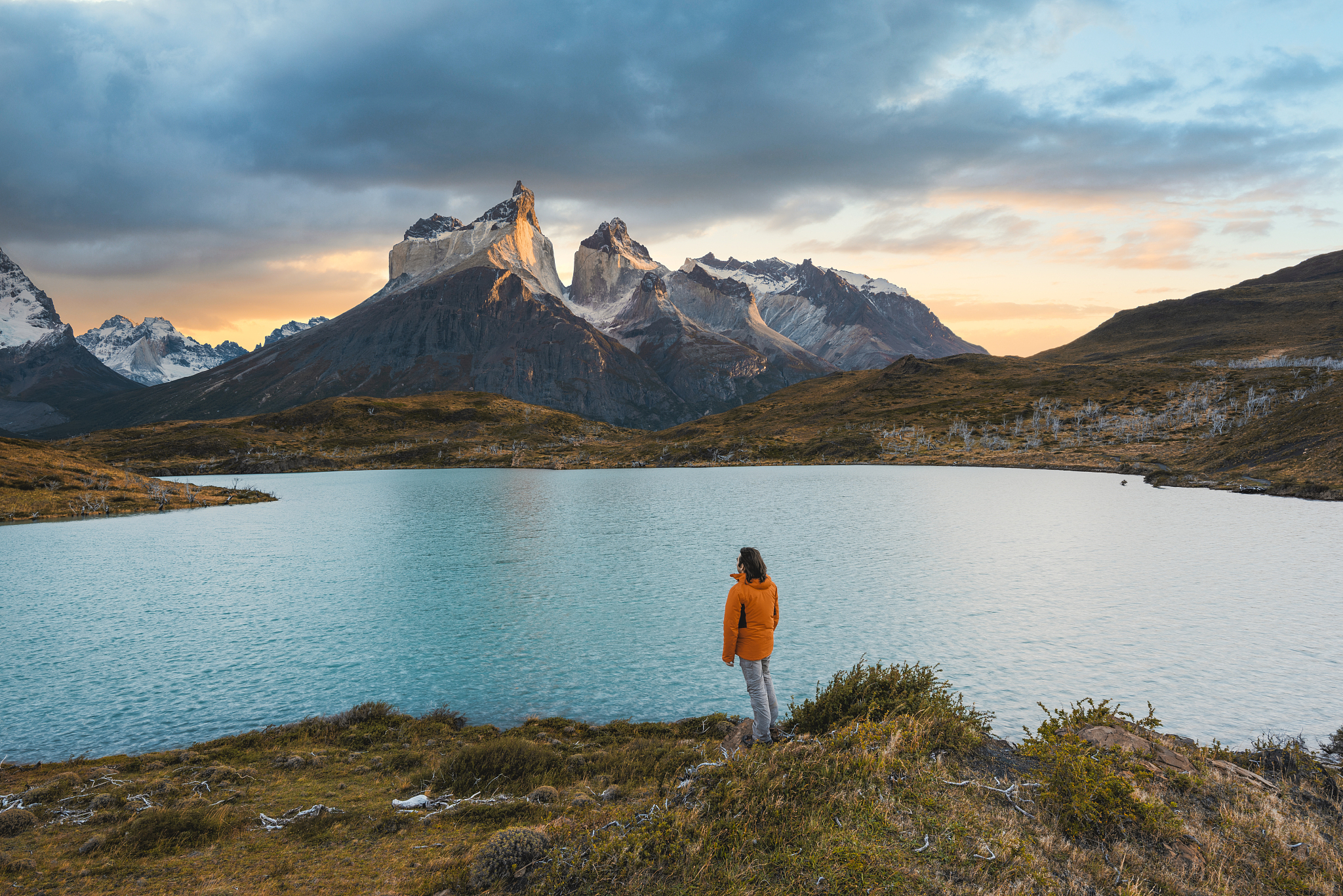 one tourist admiring the paine massif in torres del paine nation