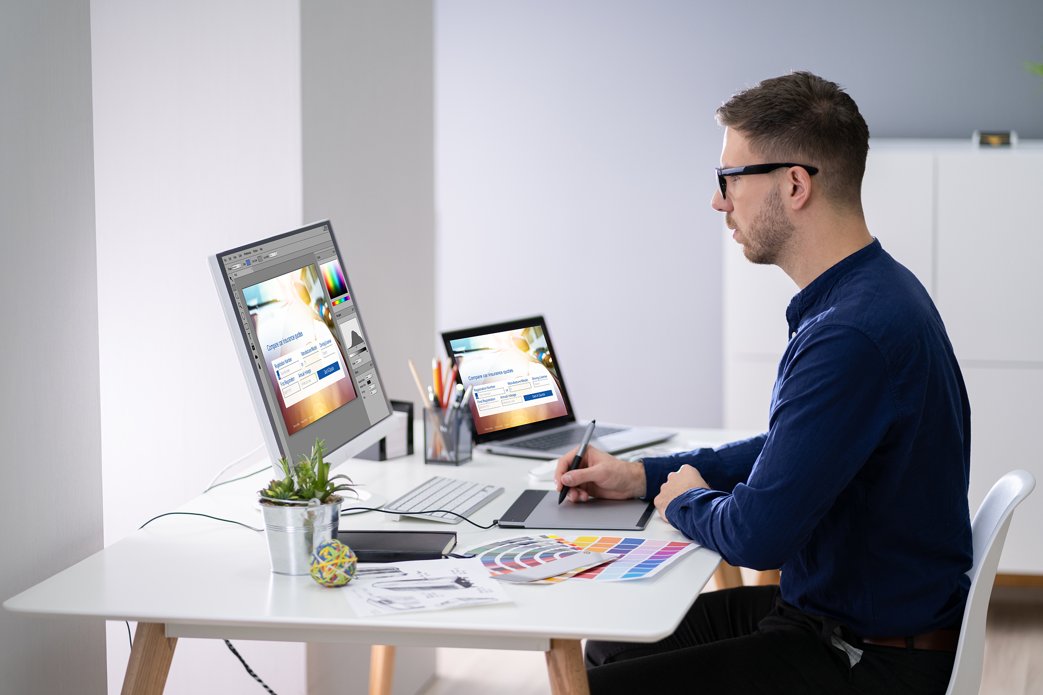 male designer working on computer